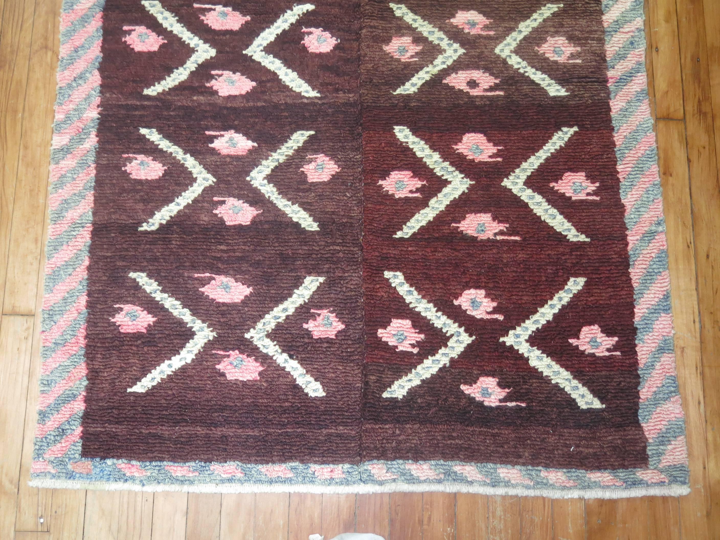 Sweet feminine looking vintage Turkish rug from the middle of the 20th century.