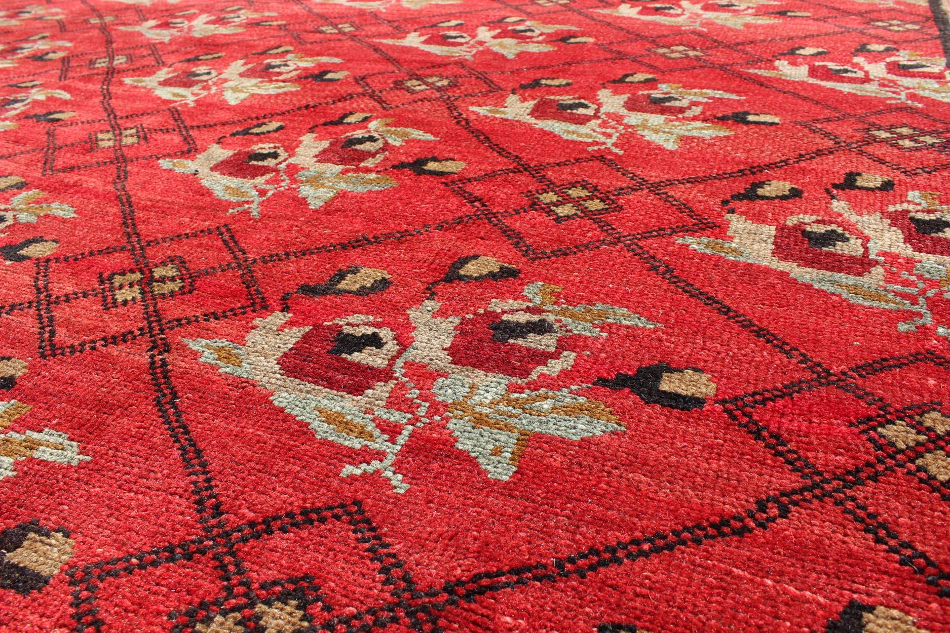 Vintage Turkish Konya Rug in Regal Red and Black Latticework Pattern In Good Condition For Sale In Atlanta, GA
