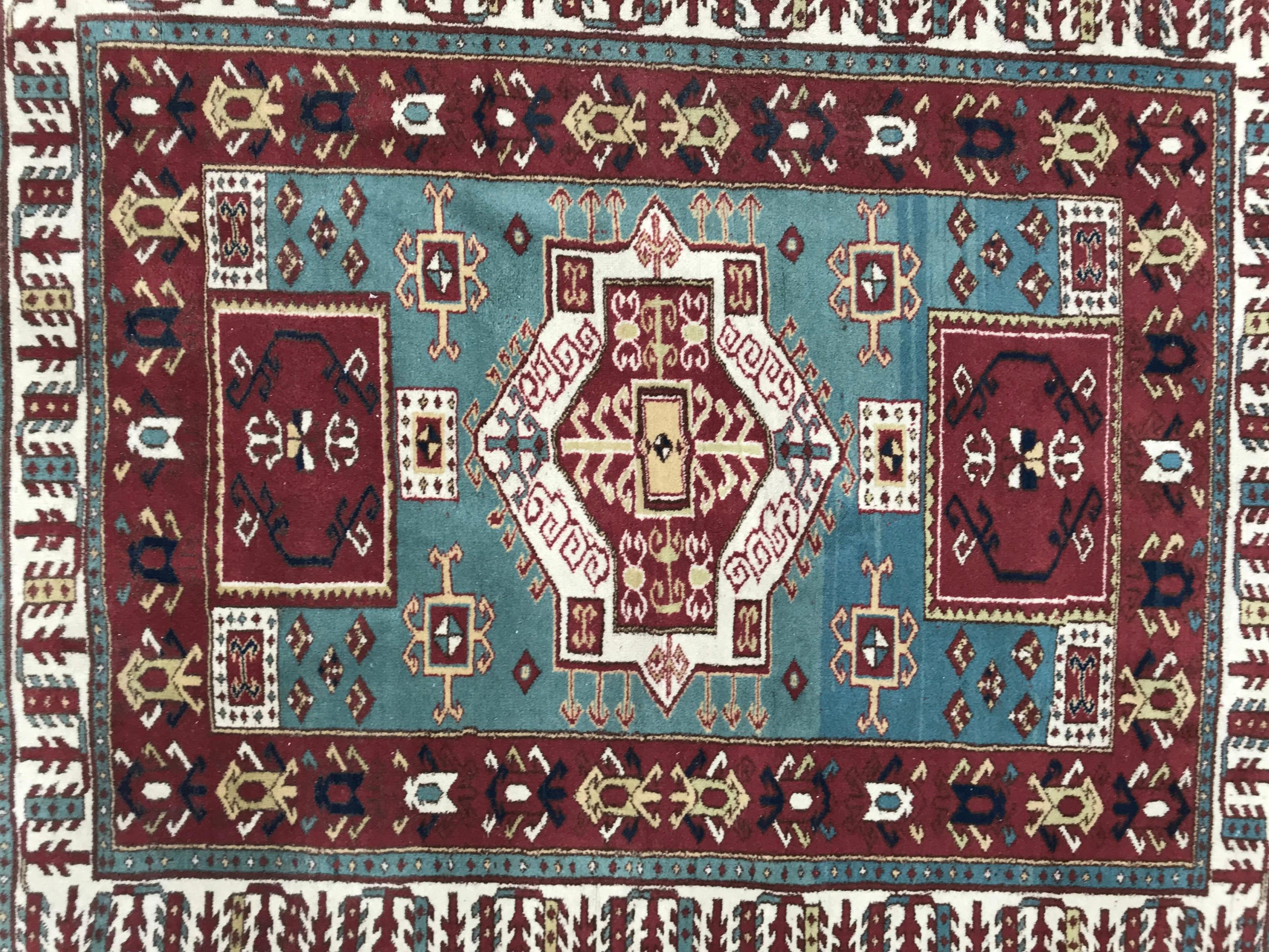 Beautiful late 20th century fine Turkish rug from Konya with a geometrical Kazak design and nice colors, with purple, yellow, green and red, entirely and finely hand knotted with wool velvet on wool foundation.

✨✨✨
