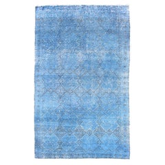 Tapis turc vintage Konya teinté en bleu avec motif de diamants sur toute sa surface