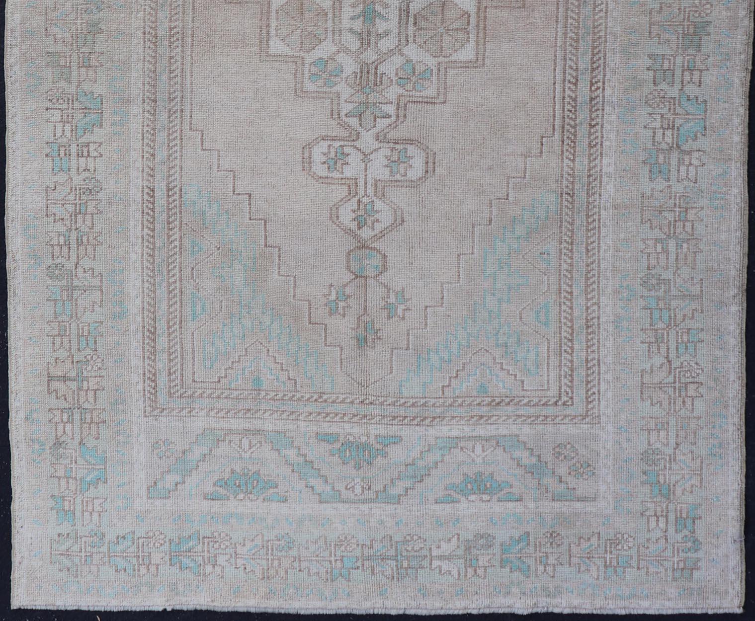 Hand-Knotted Vintage Turkish Medallion Oushak Area Rug in Tan, Taupe, Pink, and Green For Sale