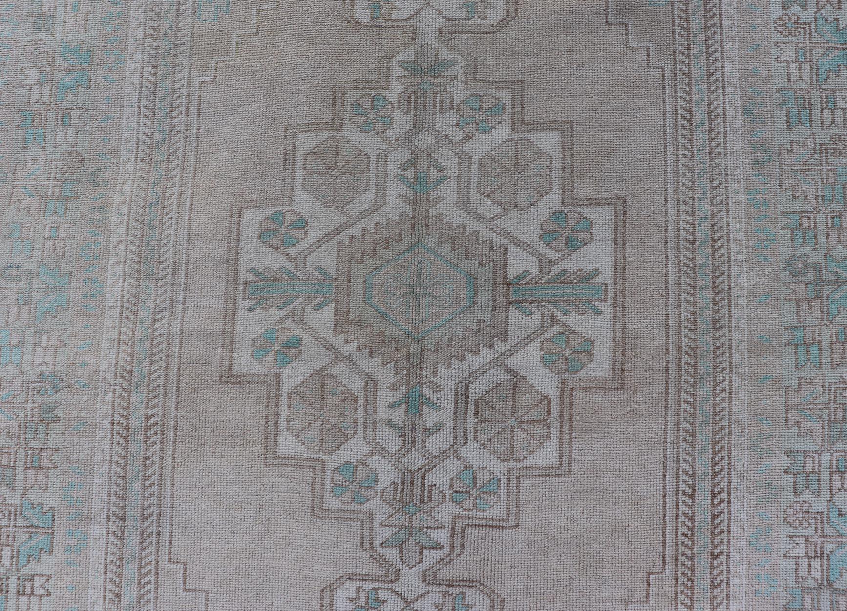 Wool Vintage Turkish Medallion Oushak Area Rug in Tan, Taupe, Pink, and Green For Sale