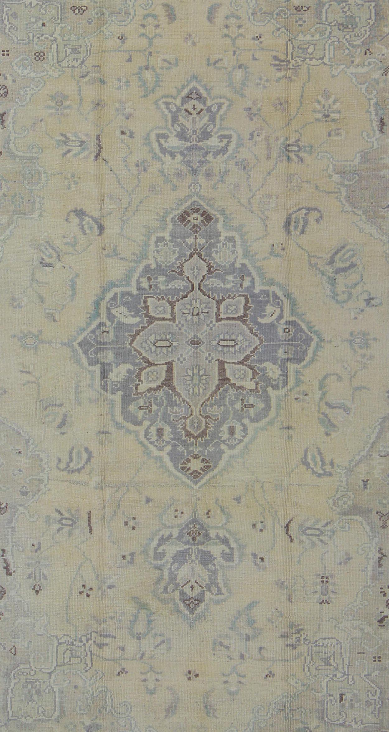 Vintage Turkish Medallion Oushak in Muted Yellow, Blue, Green, Peach & Lilac In Good Condition For Sale In Atlanta, GA