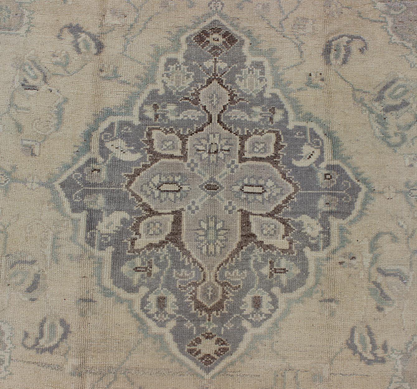 Wool Vintage Turkish Medallion Oushak in Muted Yellow, Blue, Green, Peach & Lilac For Sale