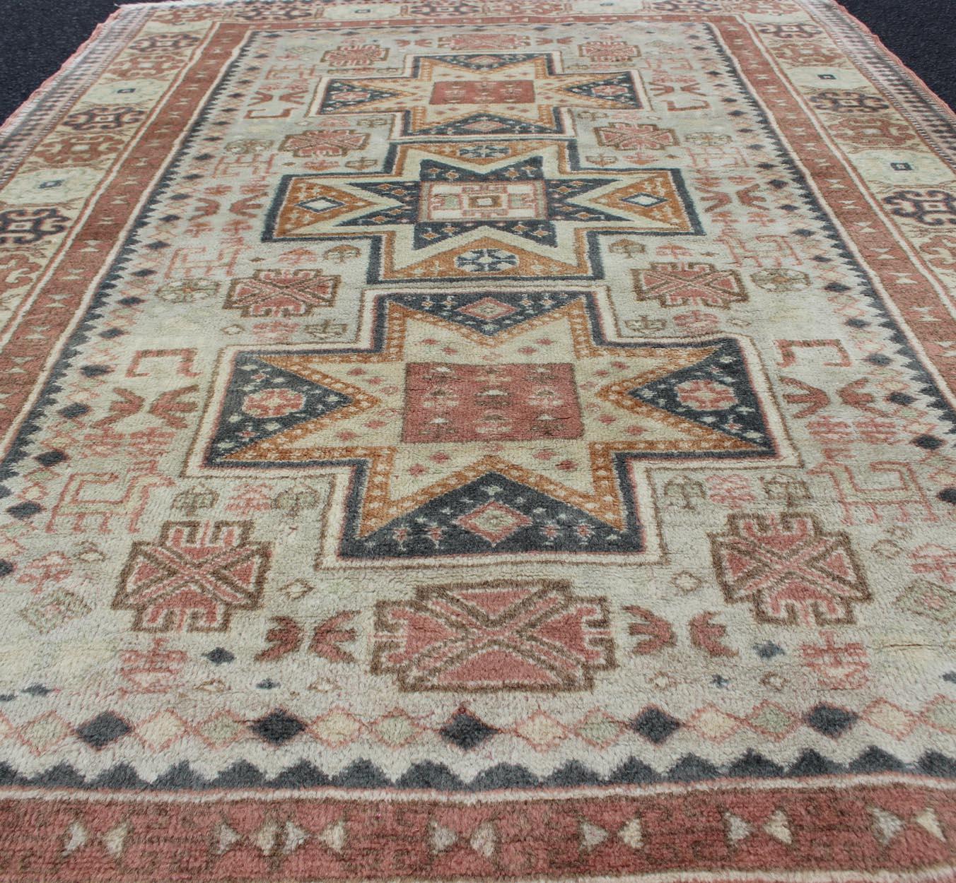 Vintage Hand Knotted Turkish Rug with Tribal Medallions and Design For Sale 1