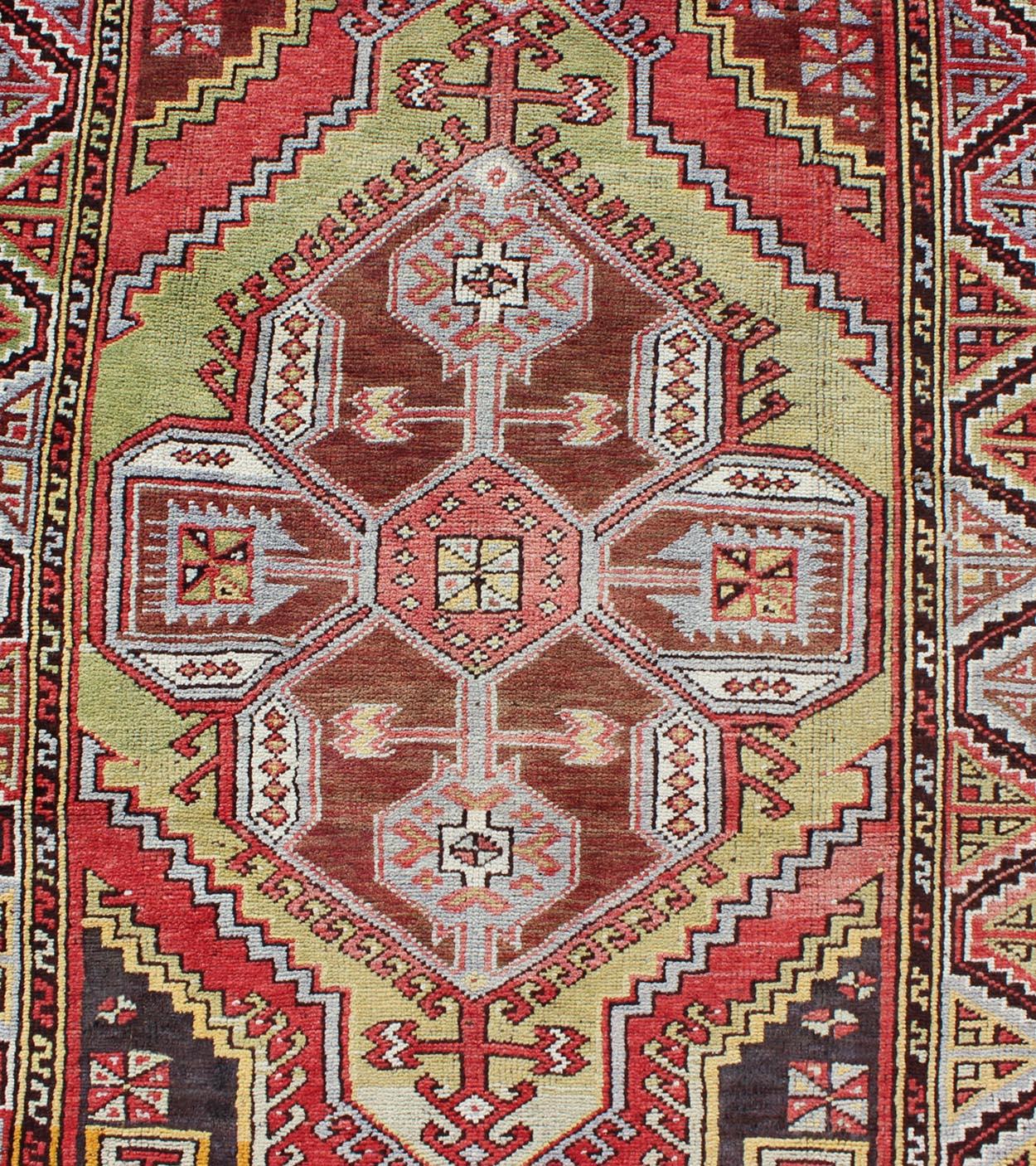 Mid-20th Century Vintage Turkish Medallion Runner with Large Medallions in Rose Red, Yellow Green For Sale