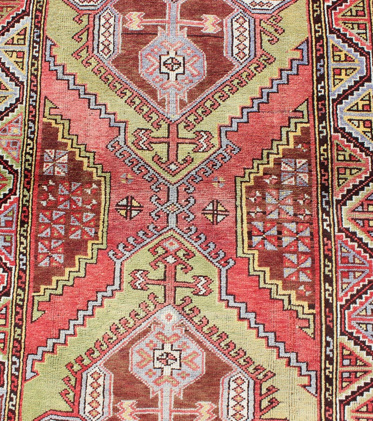 Wool Vintage Turkish Medallion Runner with Large Medallions in Rose Red, Yellow Green For Sale