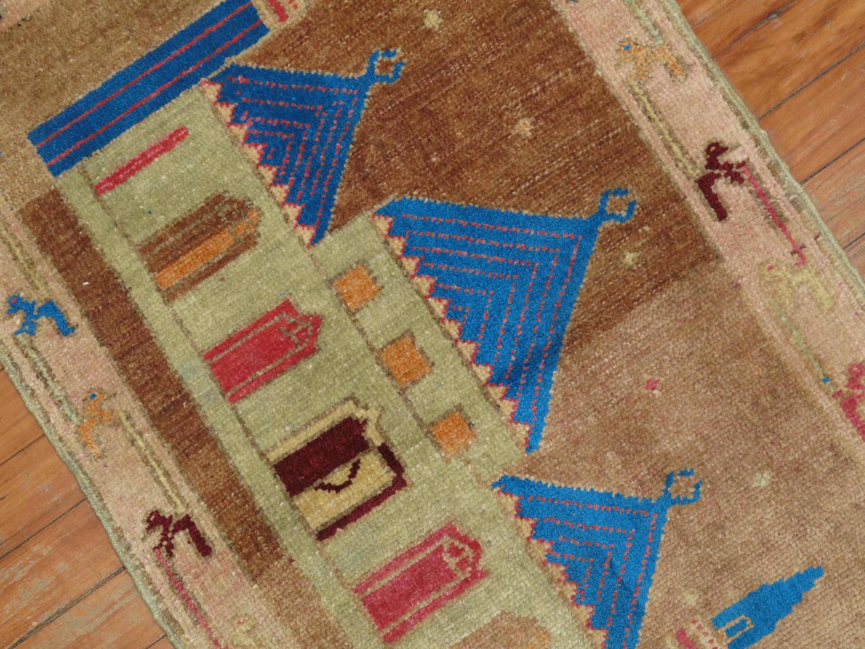 A vintage turkish throw rug depicting a colorful Mosque. Beige field highlighted by bright blue accent color

23'' x 38''

    