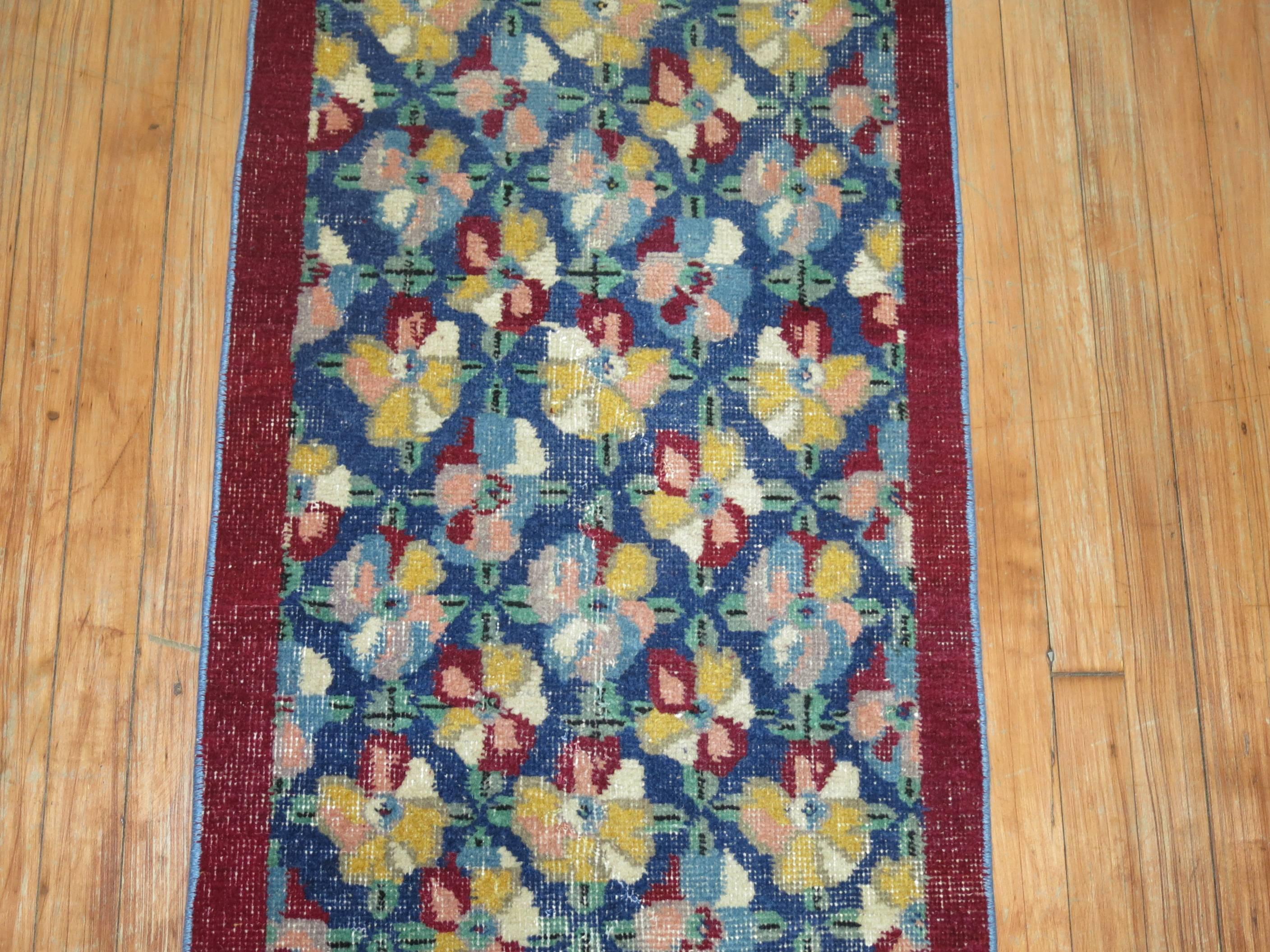 Wild colored vintage Turkish Narrow runner from the middle of the 20th century.

2' x 12'8''
