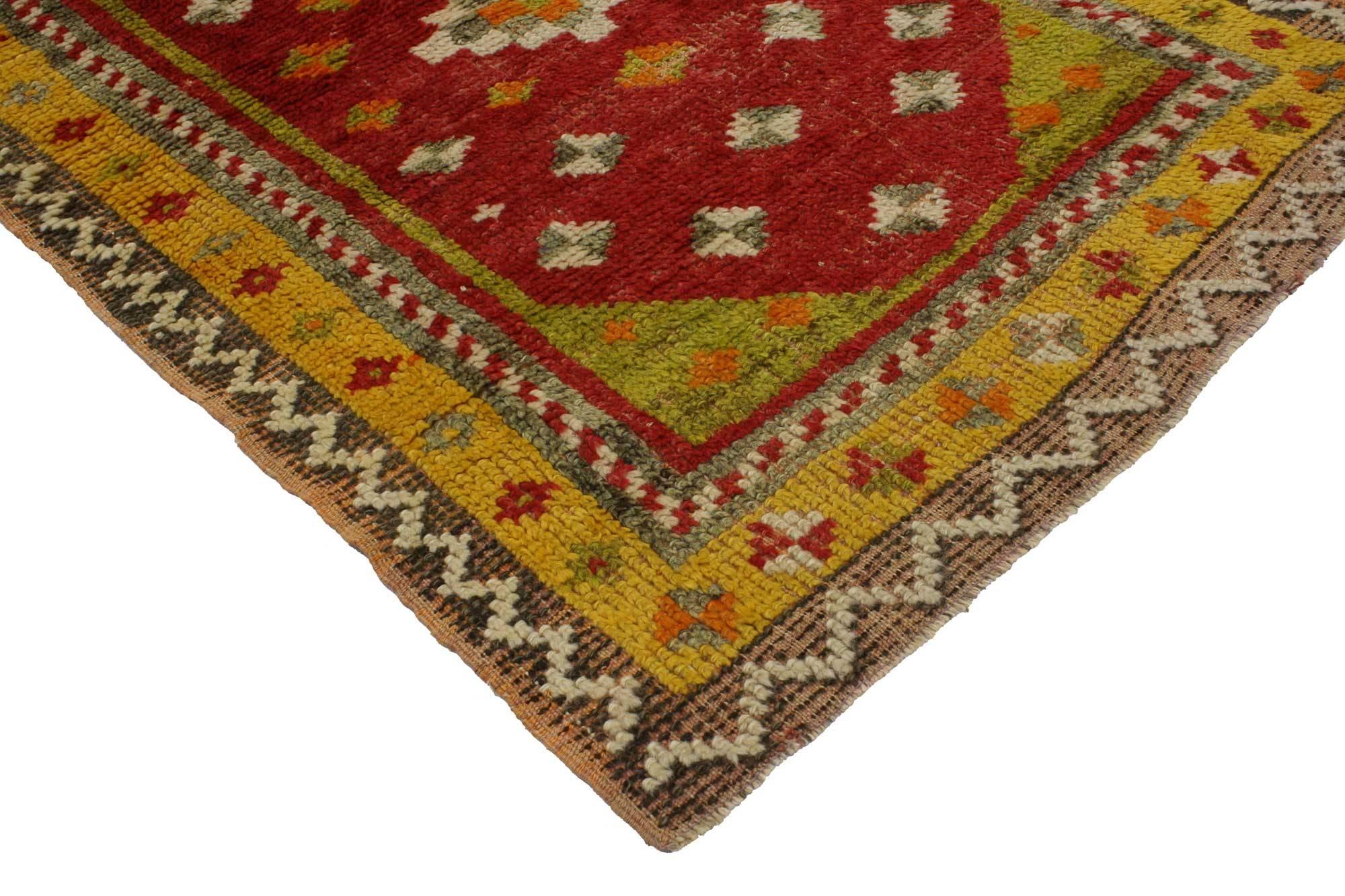 51735, vintage Turkish Oushak accent rug, entry or foyer rug. This hand knotted wool vintage Turkish Oushak rug features a stepped diamond centre medallion floating on an abrashed ruby red field, surrounded by a variety of smaller diamonds. The