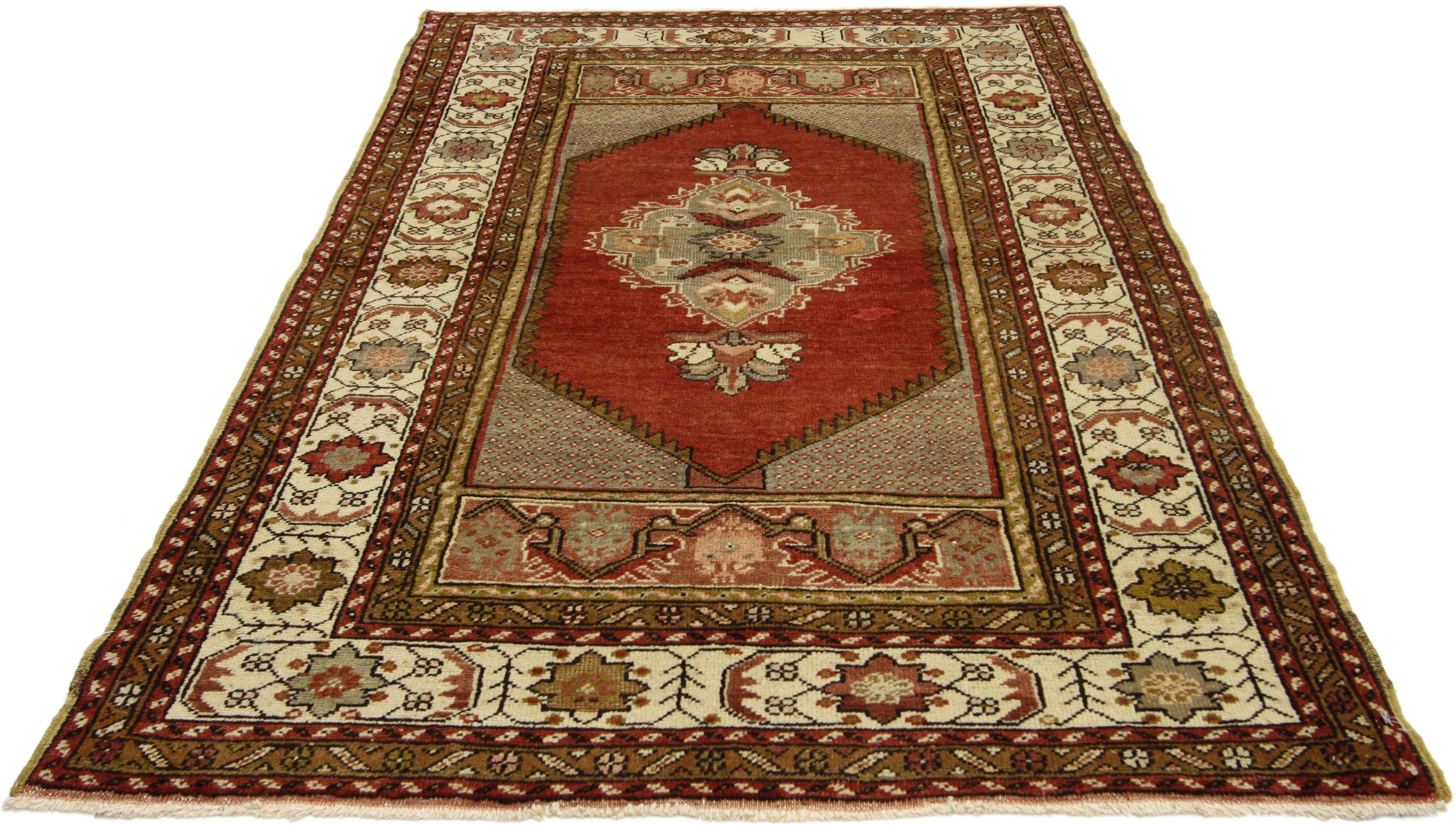 73840, vintage Turkish Oushak accent rug, entry or foyer rug. This hand knotted wool vintage Turkish Oushak rug features a cusped centre medallion anchored with blooming finials in an abrashed scarlet field. A simple zigzag saw-tooth border frames