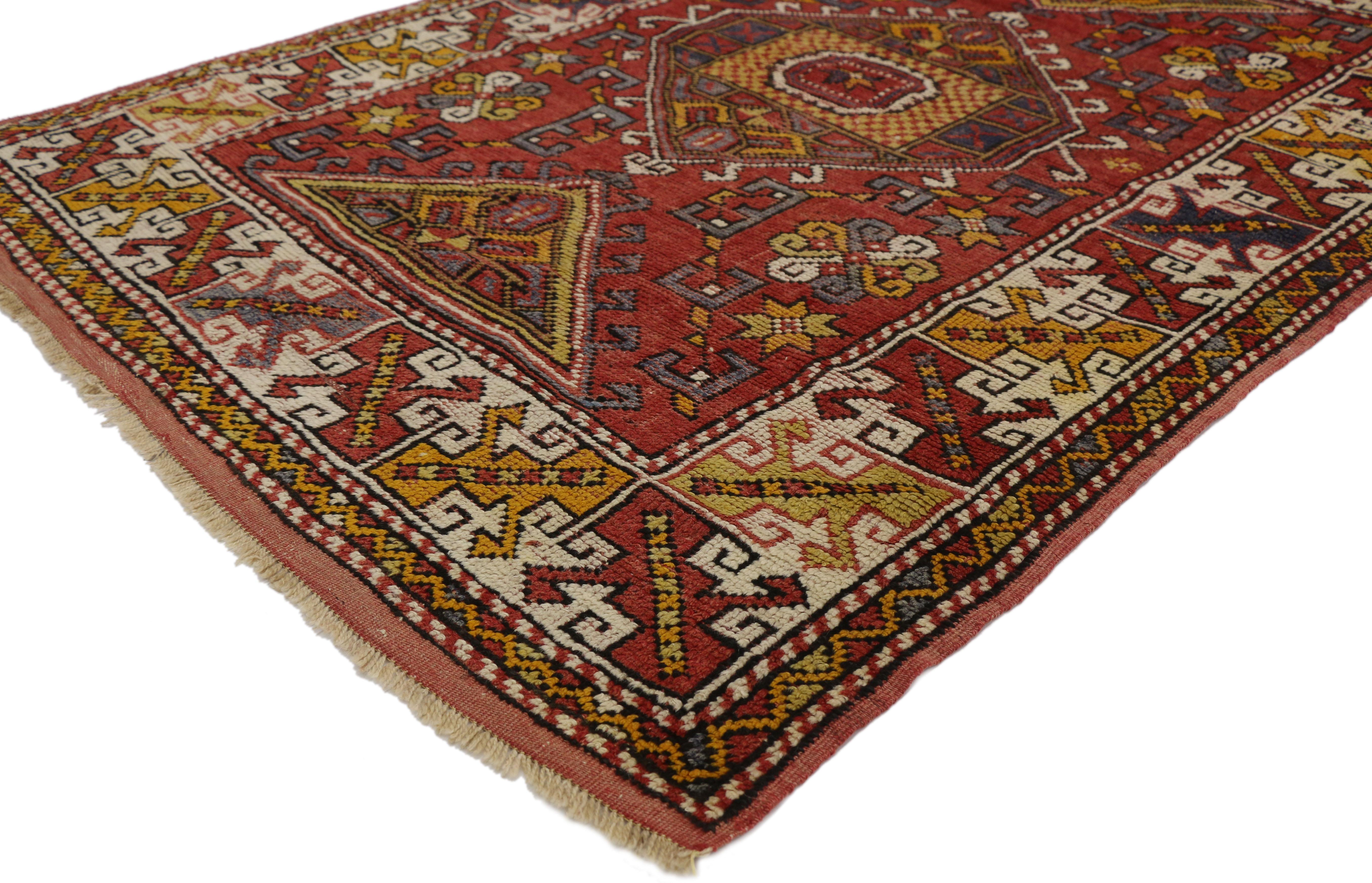 77311 vintage Turkish Oushak Accent rug for Entry, Kitchen, Foyer or Bathroom. This hand knotted wool vintage Turkish Oushak rug features a central hexagonal latch-hook amulet medallion flanked with latch-hook triangles and surrounded by a host of