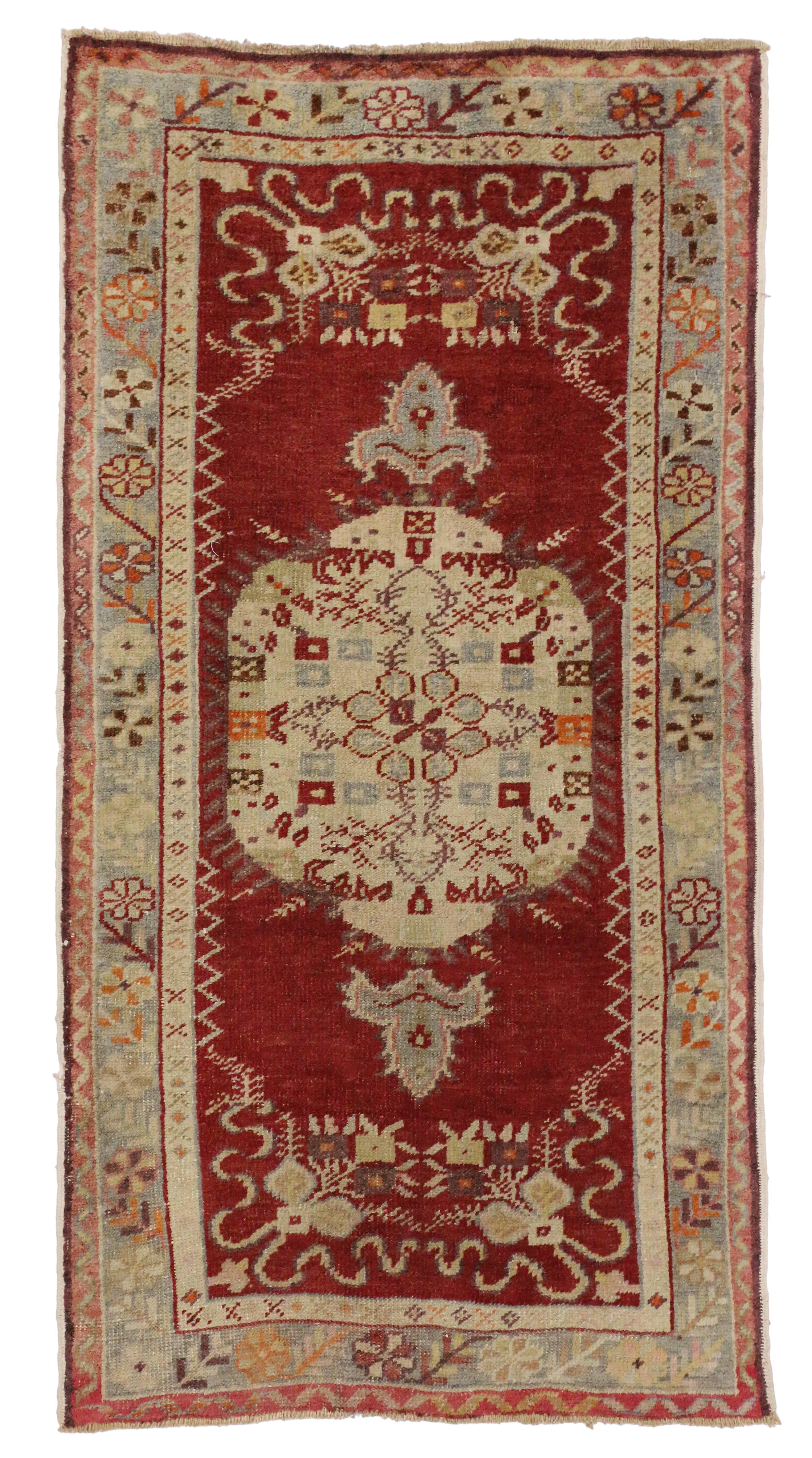 51449 vintage Turkish Oushak Accent rug with elegant style. This vintage Turkish Oushak rug features a central medallion in creamy-beige filled with red stylized geometric flowers to the centre bordered in pumpkin, muted cerulean, plum, ripe berry