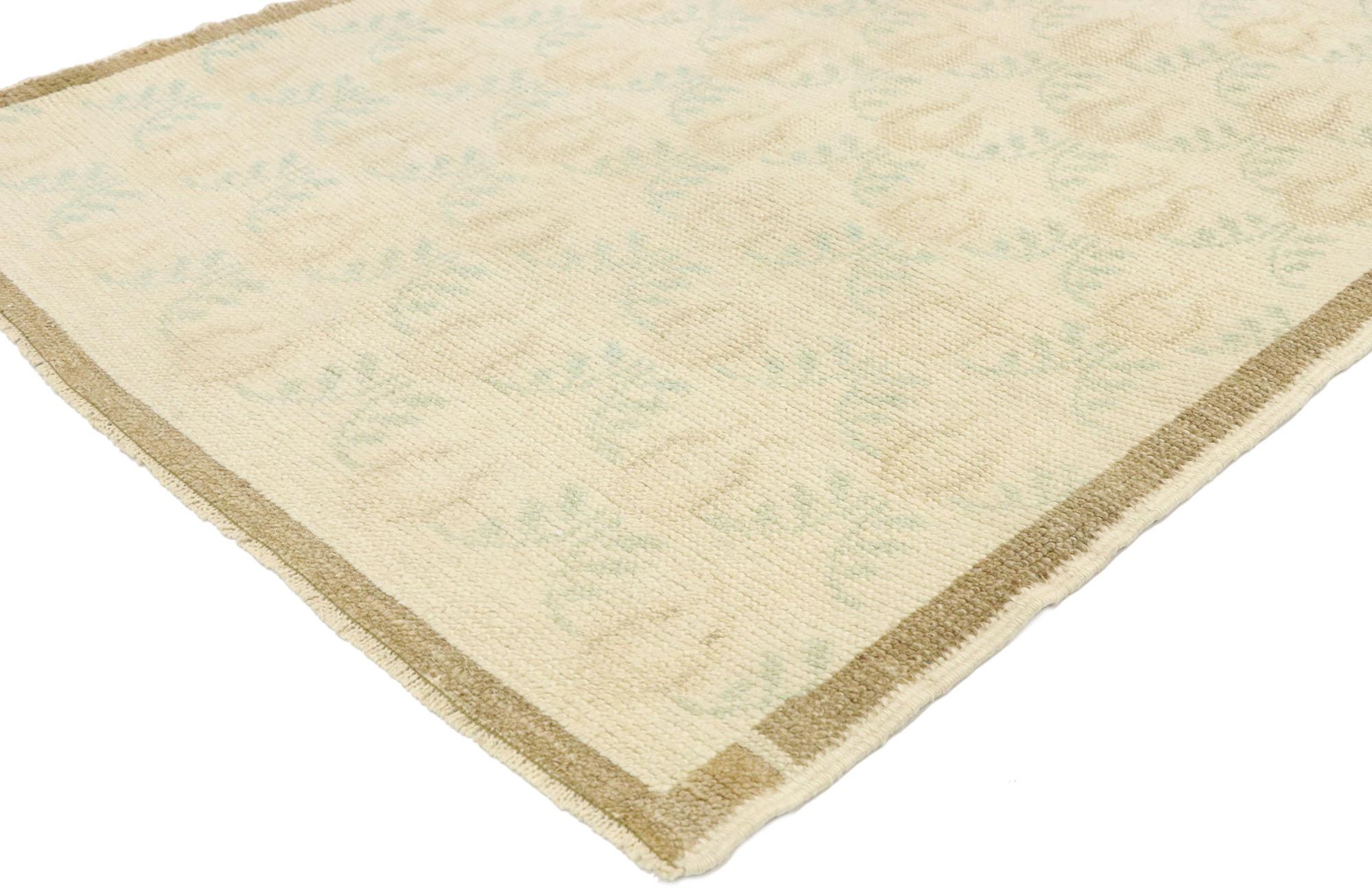 52983 vintage Turkish Oushak Accent rug with Romantic French Rococo Chateau style. Striking the perfect balance of understated elegance and symmetry with soft, bespoke vibes, this hand knotted wool vintage Turkish Oushak accent rug beautifully
