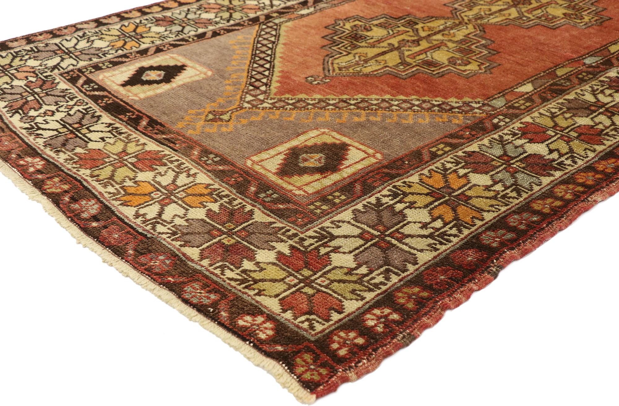50289 vintage Turkish Oushak Accent rug with Rustic Spanish Revival style. Warm and inviting combined with rustic sensibility, this hand knotted wool vintage Turkish Oushak rug astounds with its rugged beauty. The abrashed latch hook cut-out field