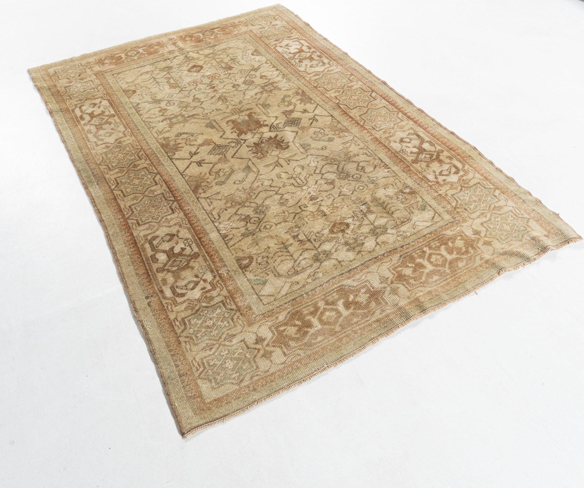 Vintage Turkish Oushak Area rug 4'1 x 6'. This rug has an Abrash which is a natural change in color that occurs when different dyes are used in a batch of wool and gives uniqueness an extra beauty to the rug. The luxurious quality of the wool (for