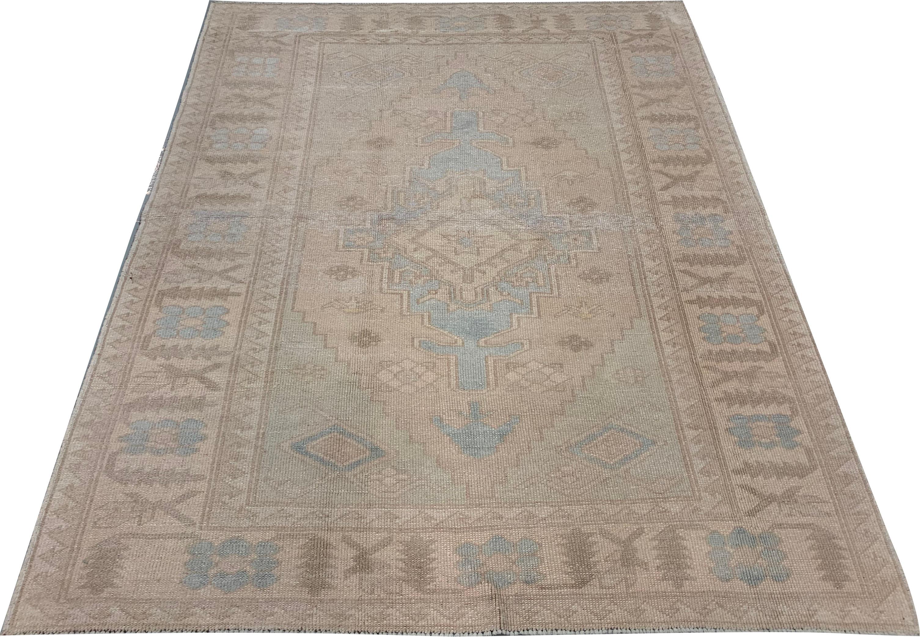 Vintage Turkish Oushak area rug, 4'3 x 5'3. Oushak's are known for their soft palettes combined with eccentric drawing. Oushak in western Turkey has the longest continuous rug weaving history, stretching back at least to the mid-fifteenth century.