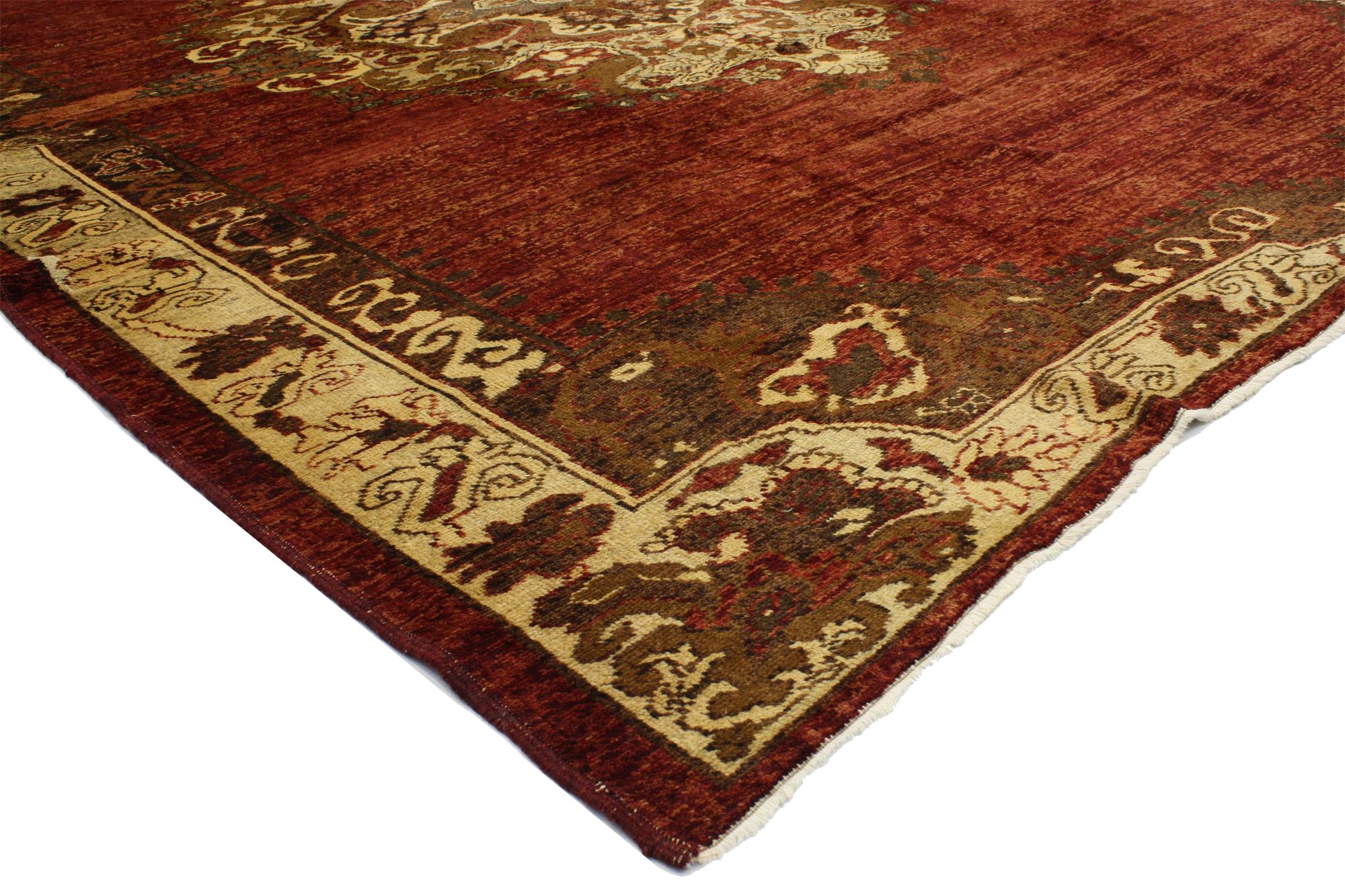 50562, vintage Turkish Oushak area rug with Luxe Medieval and Jacobean style. This hand knotted wool vintage Turkish Oushak rug features a large scale filigree medallion composed of leafy tendrils, rosettes, palmettes, curves sickle leaves, and a