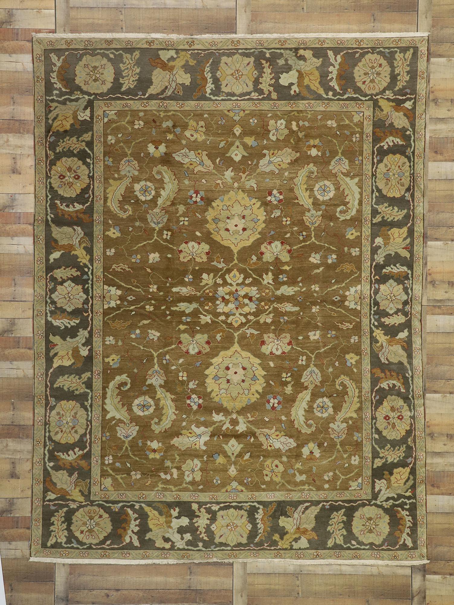74372 Vintage Turkish Oushak Area Rug with Modern Style in Warm Colors 08’09 x 11’09. This hand-knotted wool vintage Turkish Oushak rug features an allover geometric design in warm colors. The warm brown field consists of two lush palmettes
