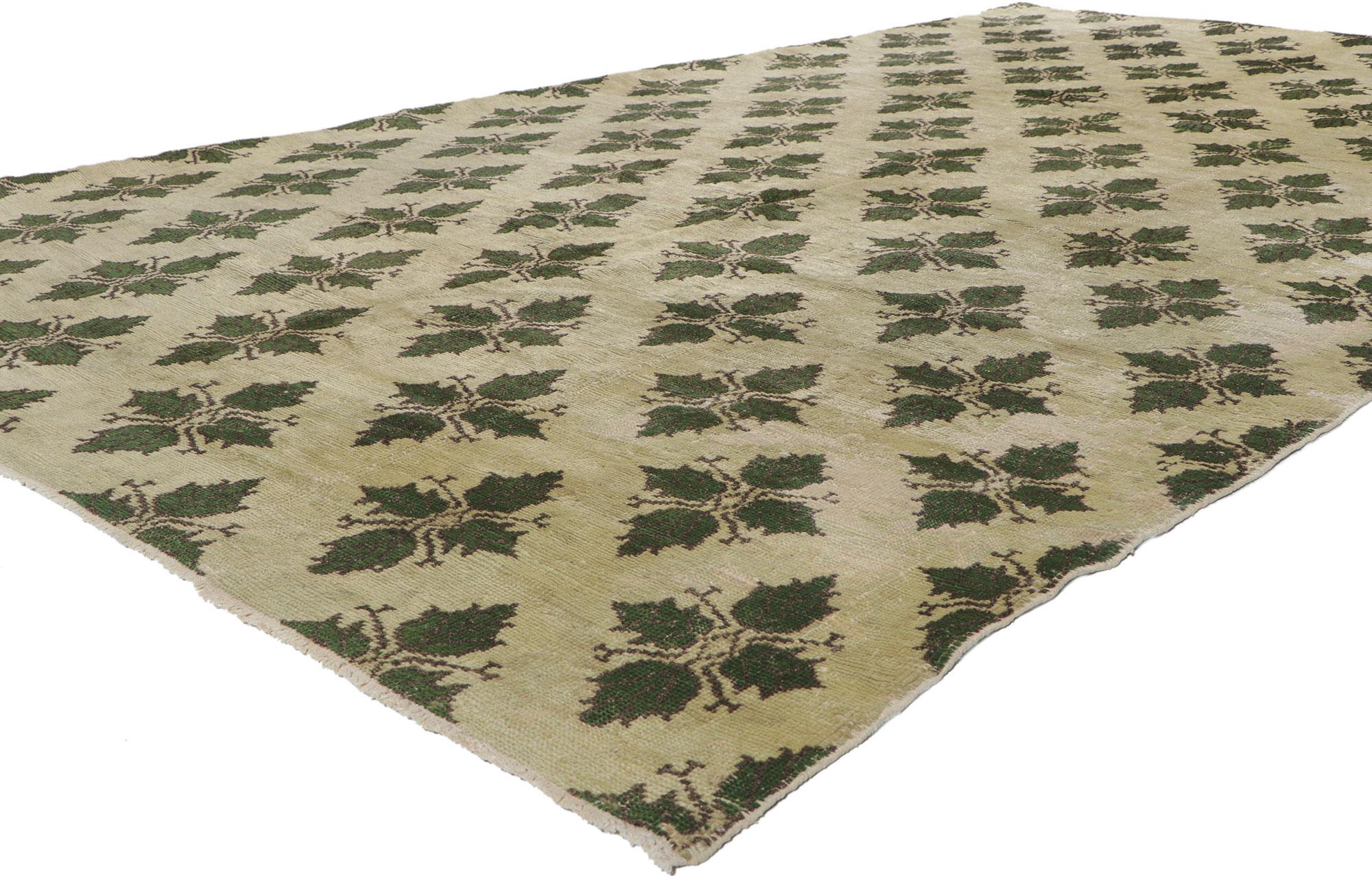50219 Vintage Turkish Oushak Rug, 06’03 x 10’07. Crafted with exquisite detail, our hand-knotted wool vintage Turkish Oushak rug embodies the timeless charm of traditional style infused with the essence of Biophilic Design. Delicately woven, its