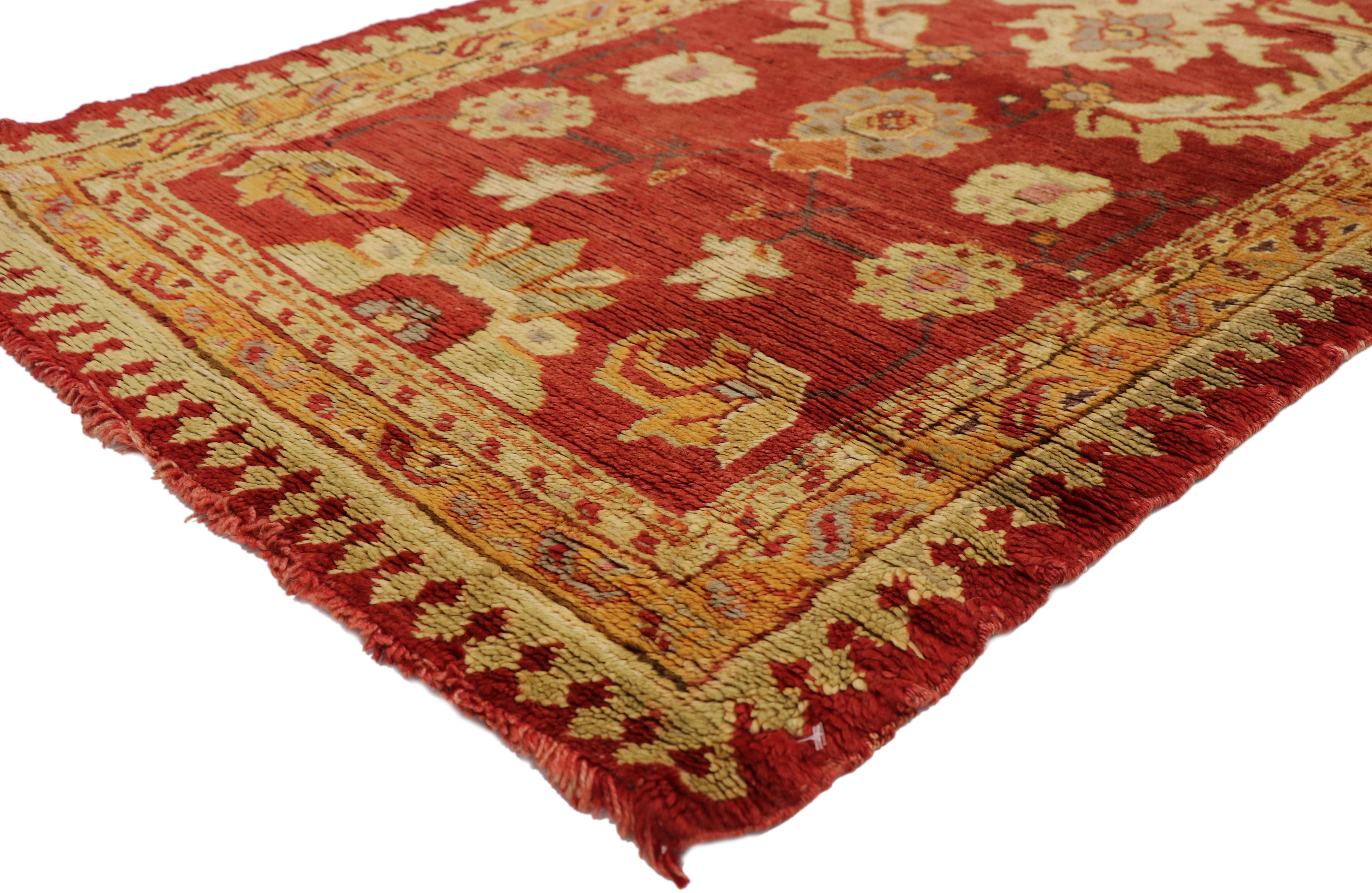 74016 Vintage Turkish Oushak Runner with English Manor House Tudor Style. Full of character and stately presence, this vintage Turkish Oushak carpet runner showcases an extravagant geometric design reflecting a modern traditional style. Rendered in