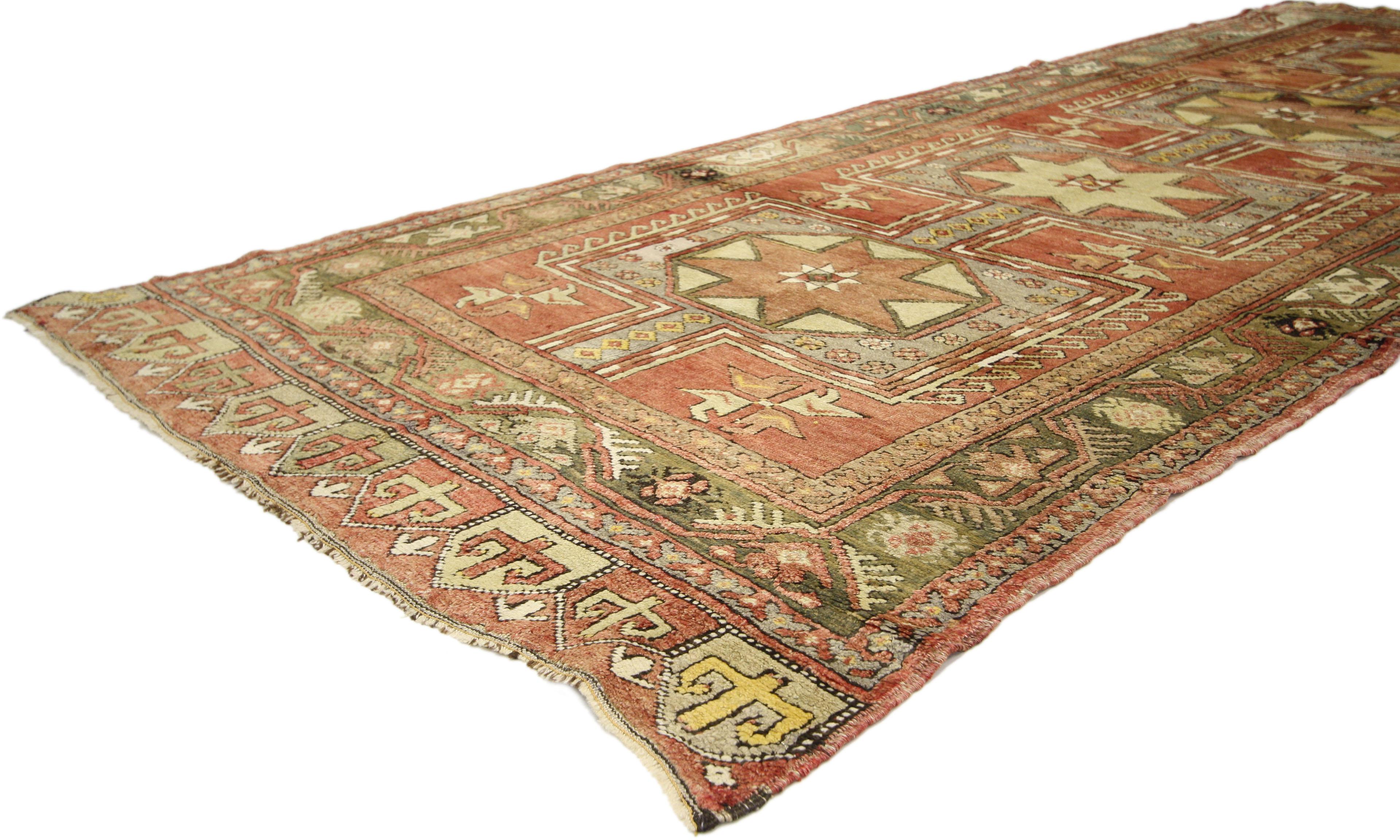 73875 Vintage Turkish Oushak Gallery Rug, Wide Hallway Runner. This vintage Turkish Oushak carpet runner with modern tribal style communicates some of the finer and more important points of traditional Turkish design elements. Features a stacked row