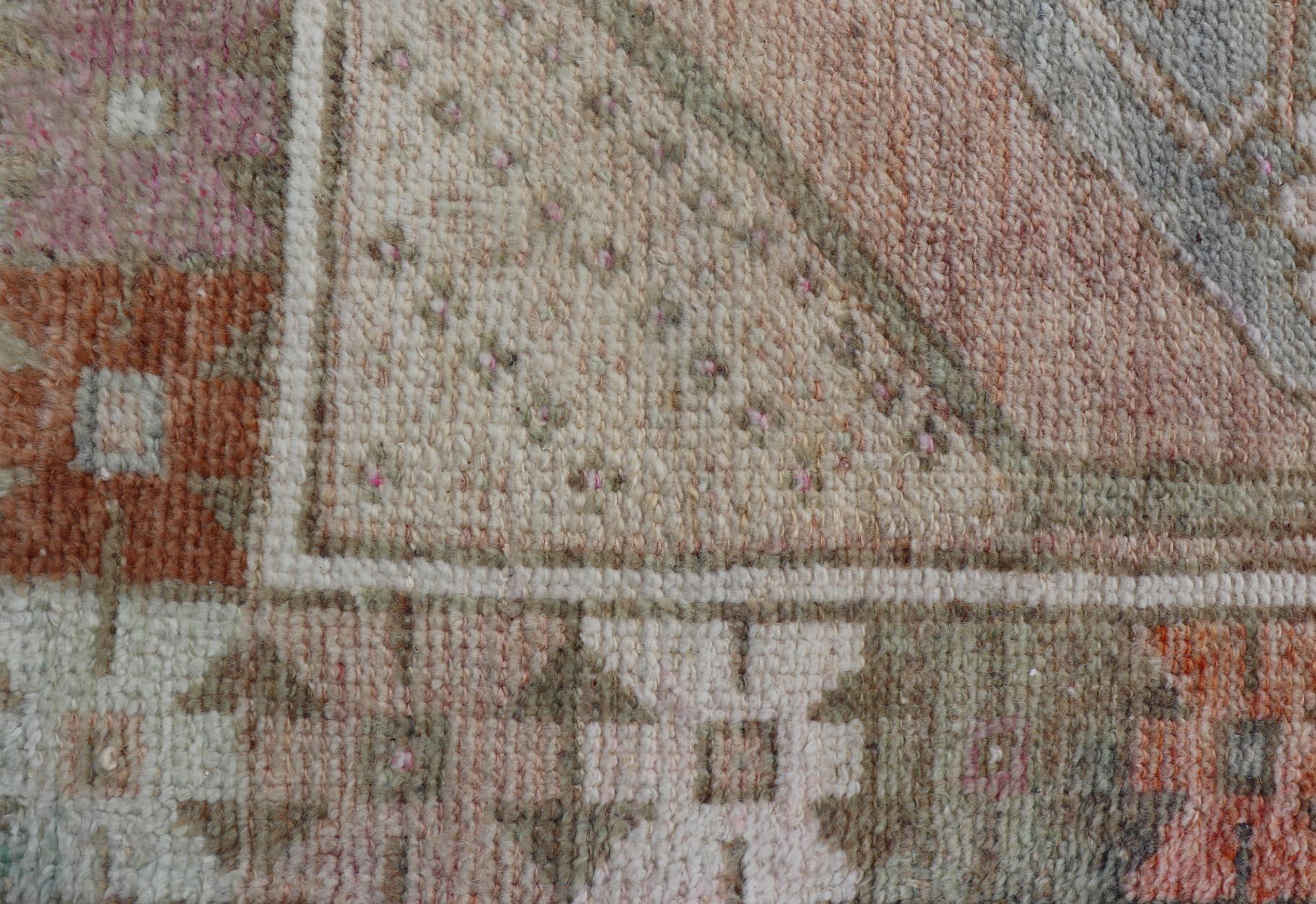 Vintage Turkish Oushak Carpet with Beautiful Floral Motifs in Tan, Camel, Orange. Keivan Woven Arts / rug EN-15368, country of origin / type: Turkey / Oushak, circa mid-20th century.
Measures: 2'9 x 4'4 
This mid-century vintage Oushak carpet