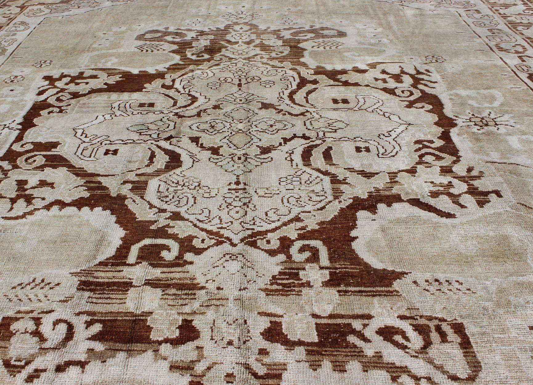 Wool Vintage Turkish Oushak Carpet with Medallion in Sienna, Mocha and Bone Colors For Sale