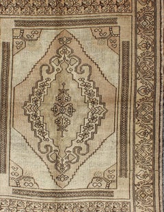 Vintage Turkish Oushak Carpet with Stylized Design in Brown, Cream, and Tan