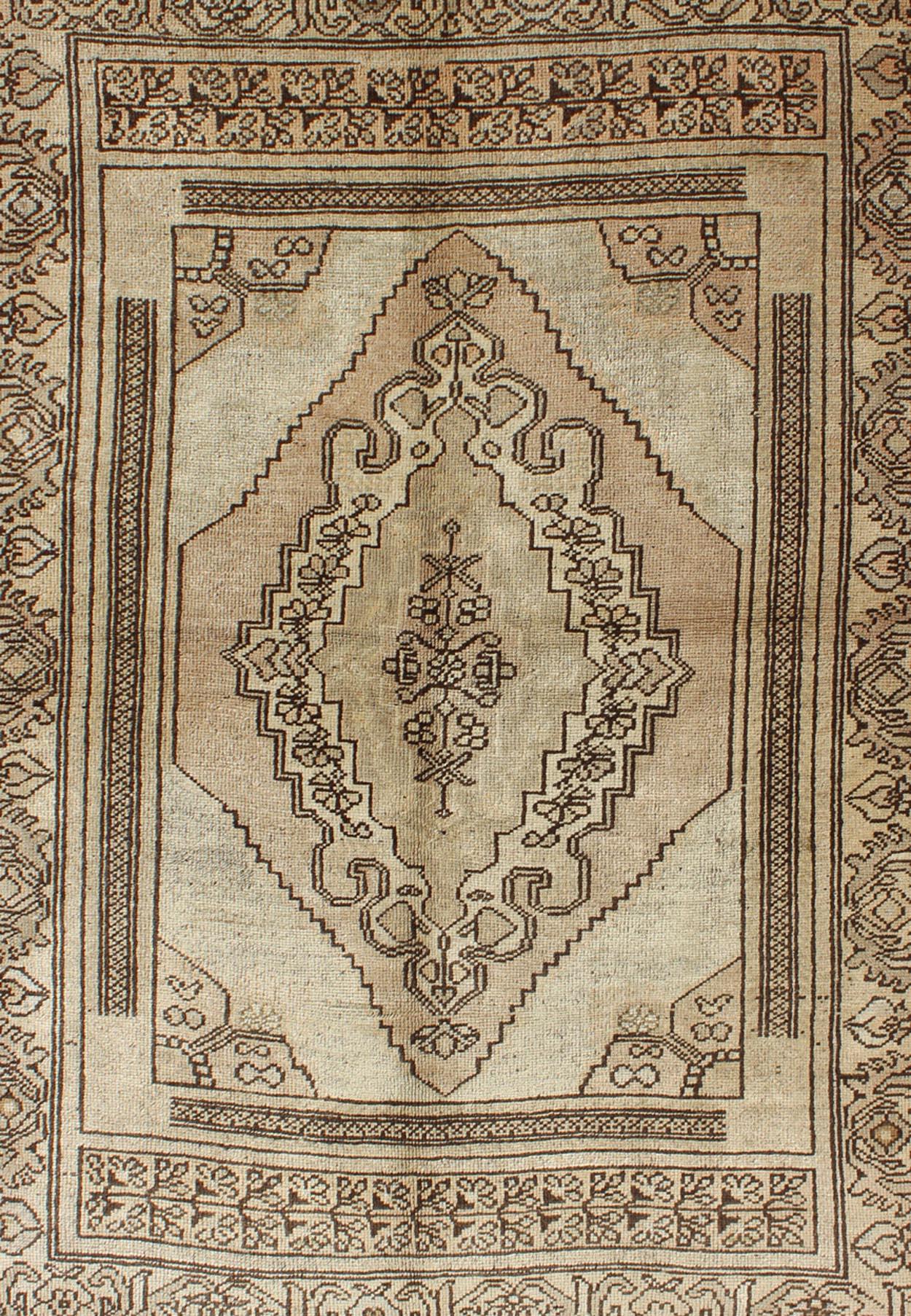 Vintage Turkish Oushak Carpet with Stylized Design in Brown, Cream, and Tan In Good Condition For Sale In Atlanta, GA
