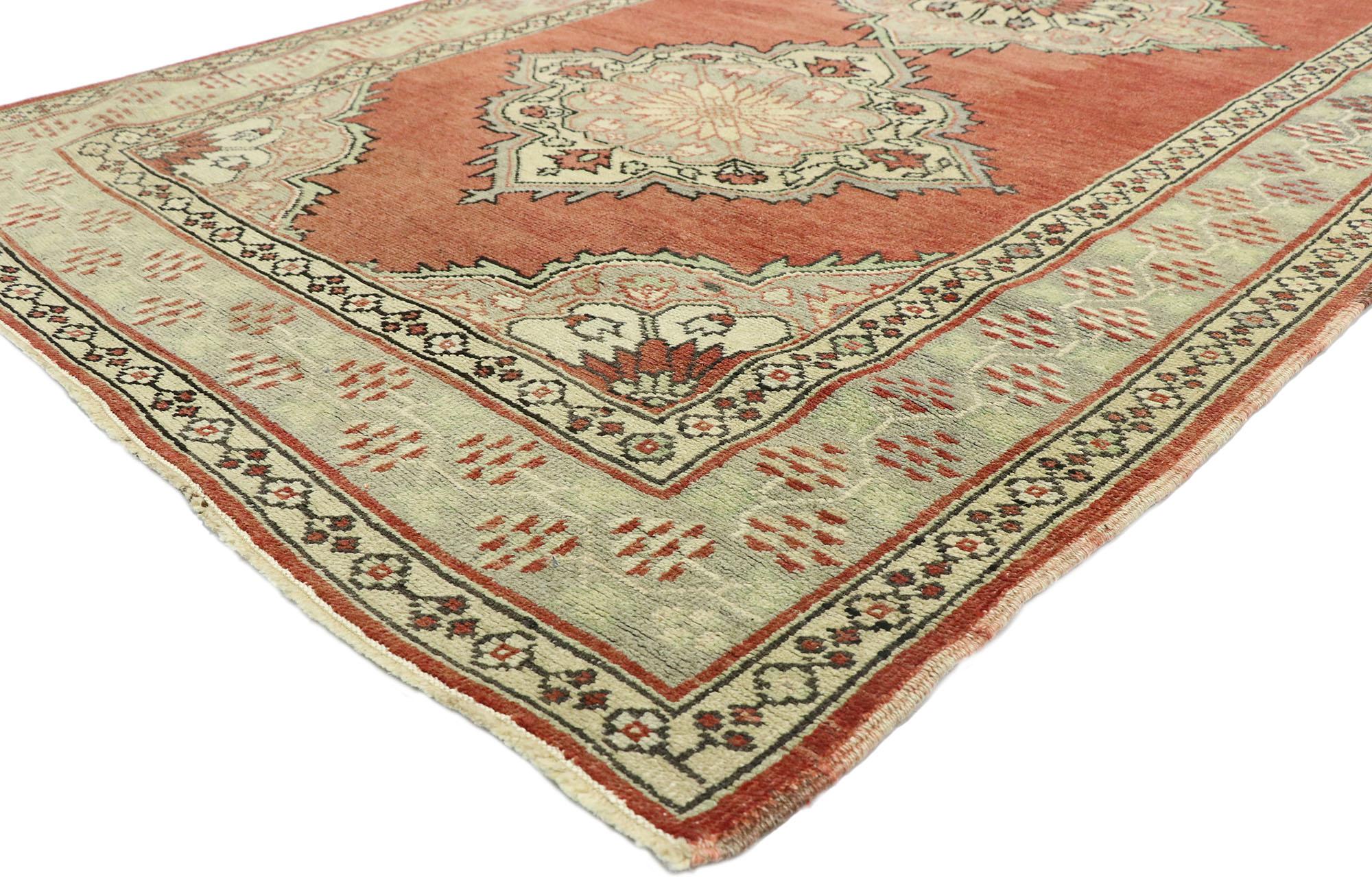 52170 Vintage Turkish Oushak Extra-Long Runner with Modern Tudor Style. This hand-knotted wool vintage Turkish Oushak runner features eight cusped medallions patterned with roundels and palmettes floating in an abrashed crimson field. Ornate