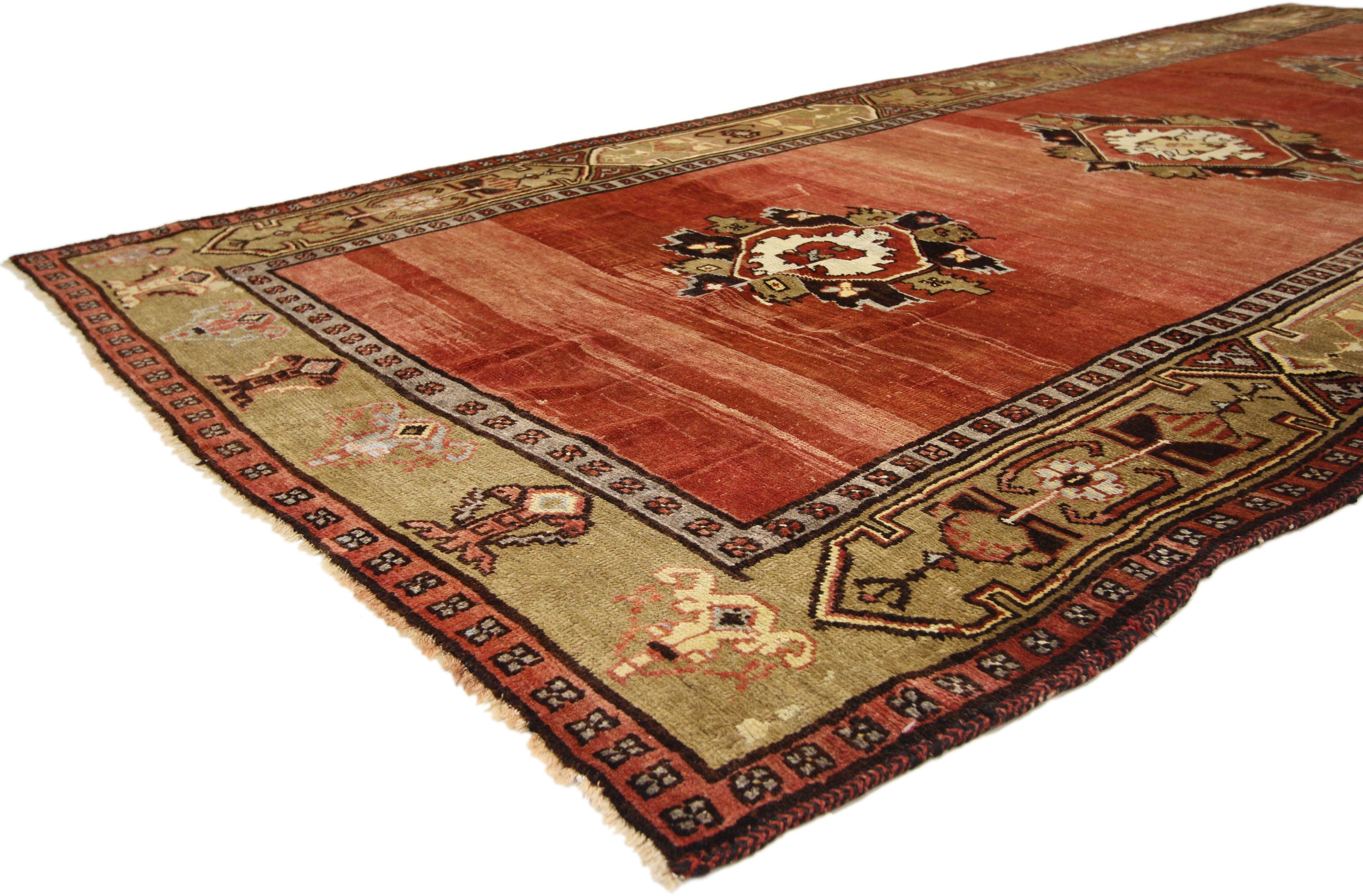 73901, vintage Turkish Oushak rug with Traditional style. ??Impressive in style and impeccably woven, this vintage Turkish Oushak rug with modern style features three geometric medallions in an open abrash red field surrounded by a Turkish tribal