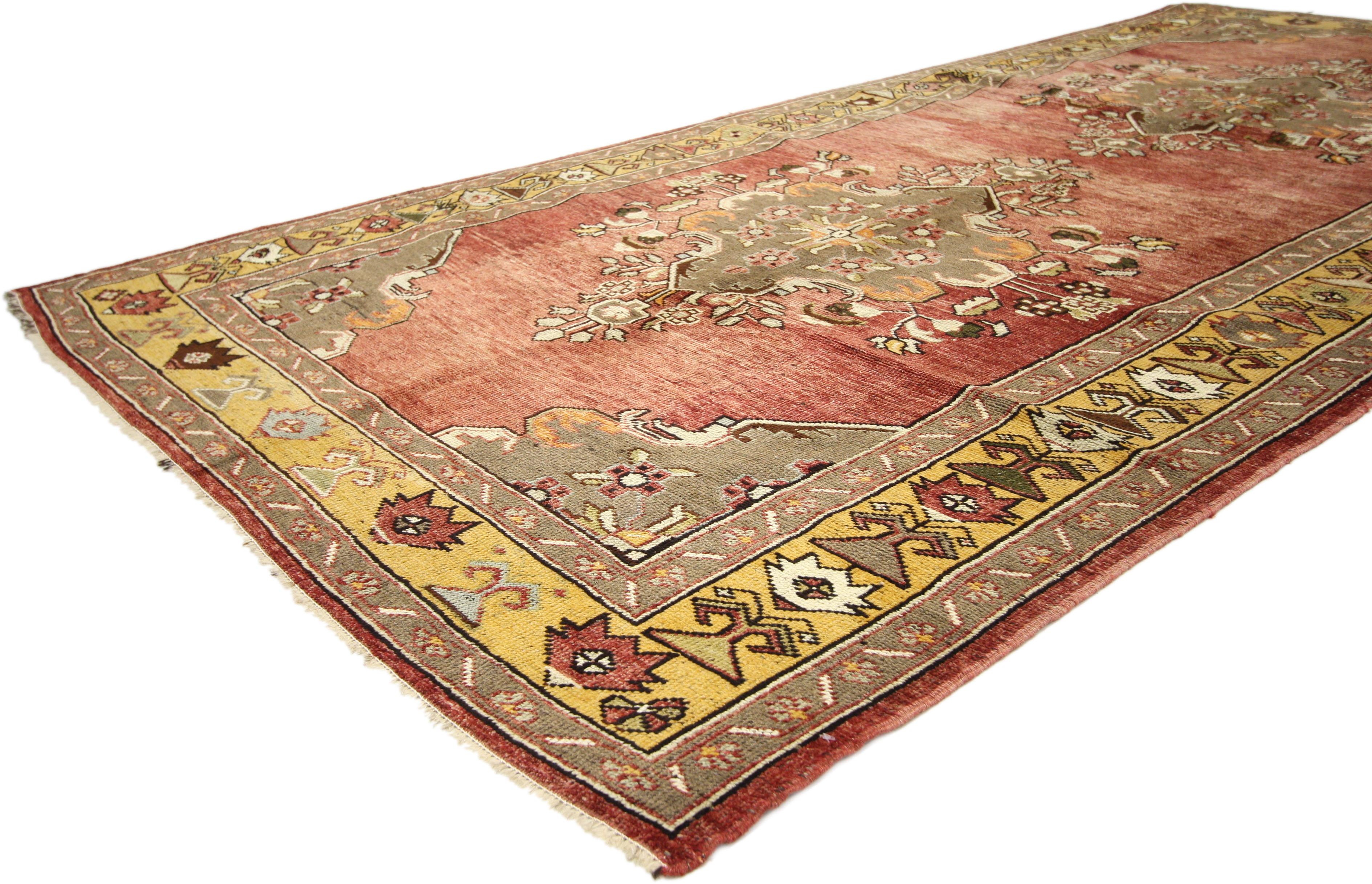 73888 Vintage Turkish Oushak Gallery Rug, Wide Hallway Runner. Time-softened shades of red, olive green and warm golden saffron yellow characterize this vintage Turkish Oushak carpet runner (gallery rug). Featuring two large medallions embellished