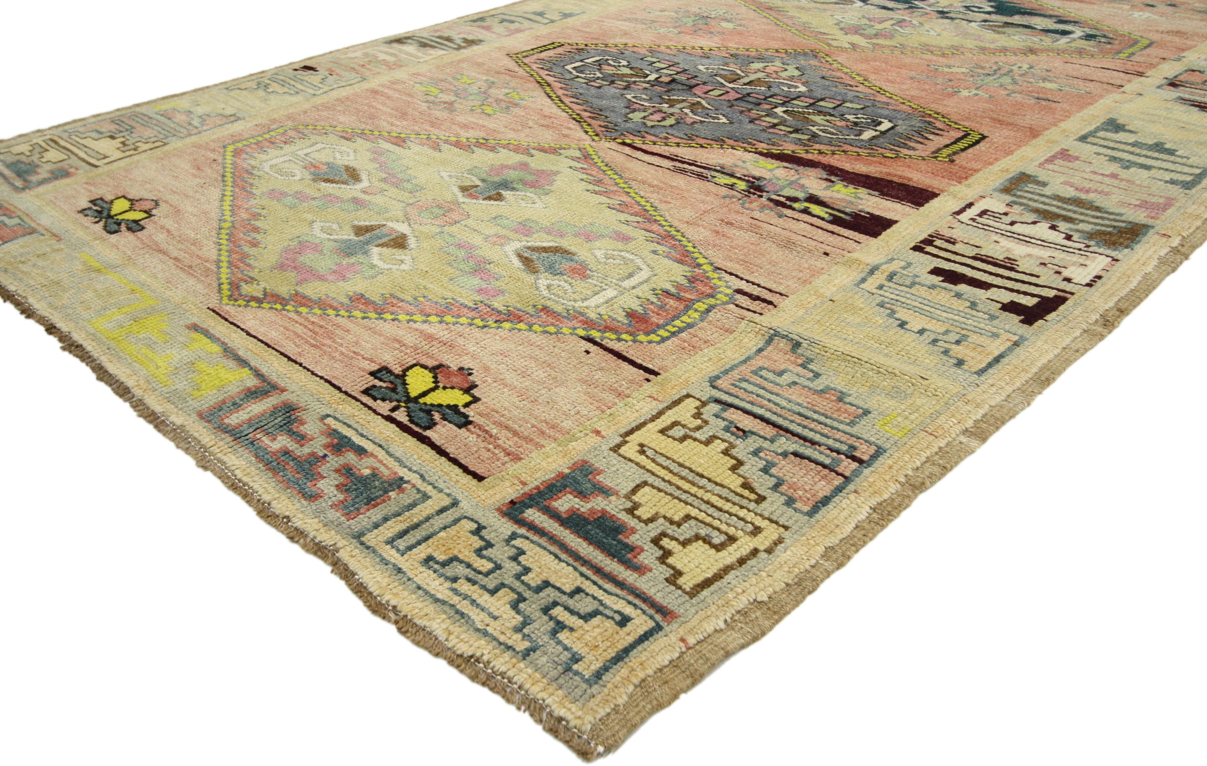52414 vintage Turkish Oushak gallery rug, wide hallway runner. This hand knotted wool antique-washed vintage Turkish Oushak rug features five large hexagonal medallions spread across an abrashed field. Each medallion contains four stylized palmettes