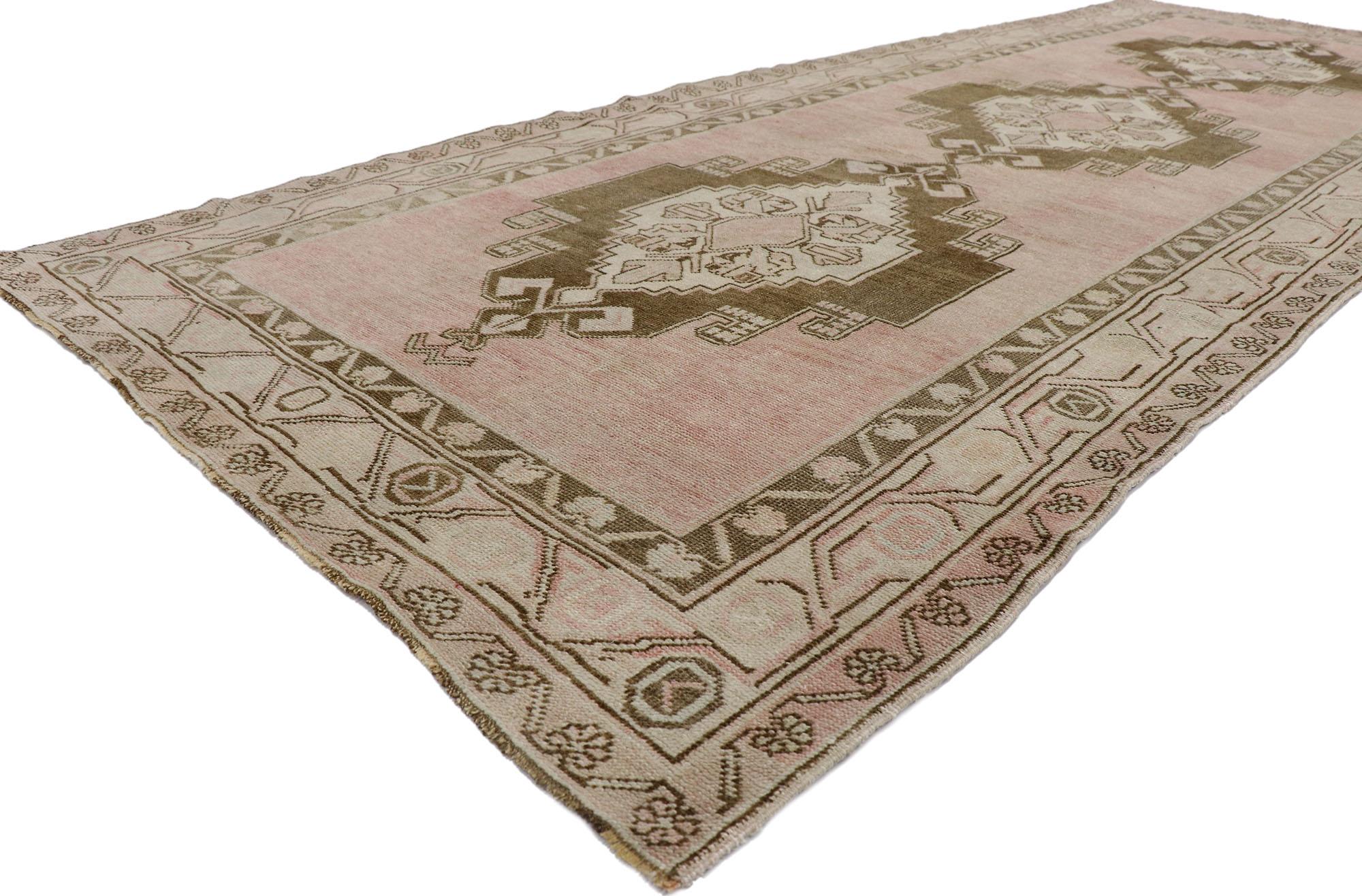 53618 Vintage Turkish Oushak Gallery rug with Boho Chic Tribal Style 04'08 x 12'00. With its expressive tribal design and soft colors, this hand-knotted wool vintage Turkish Oushak gallery rug is a captivating vision of woven beauty. The abrashed