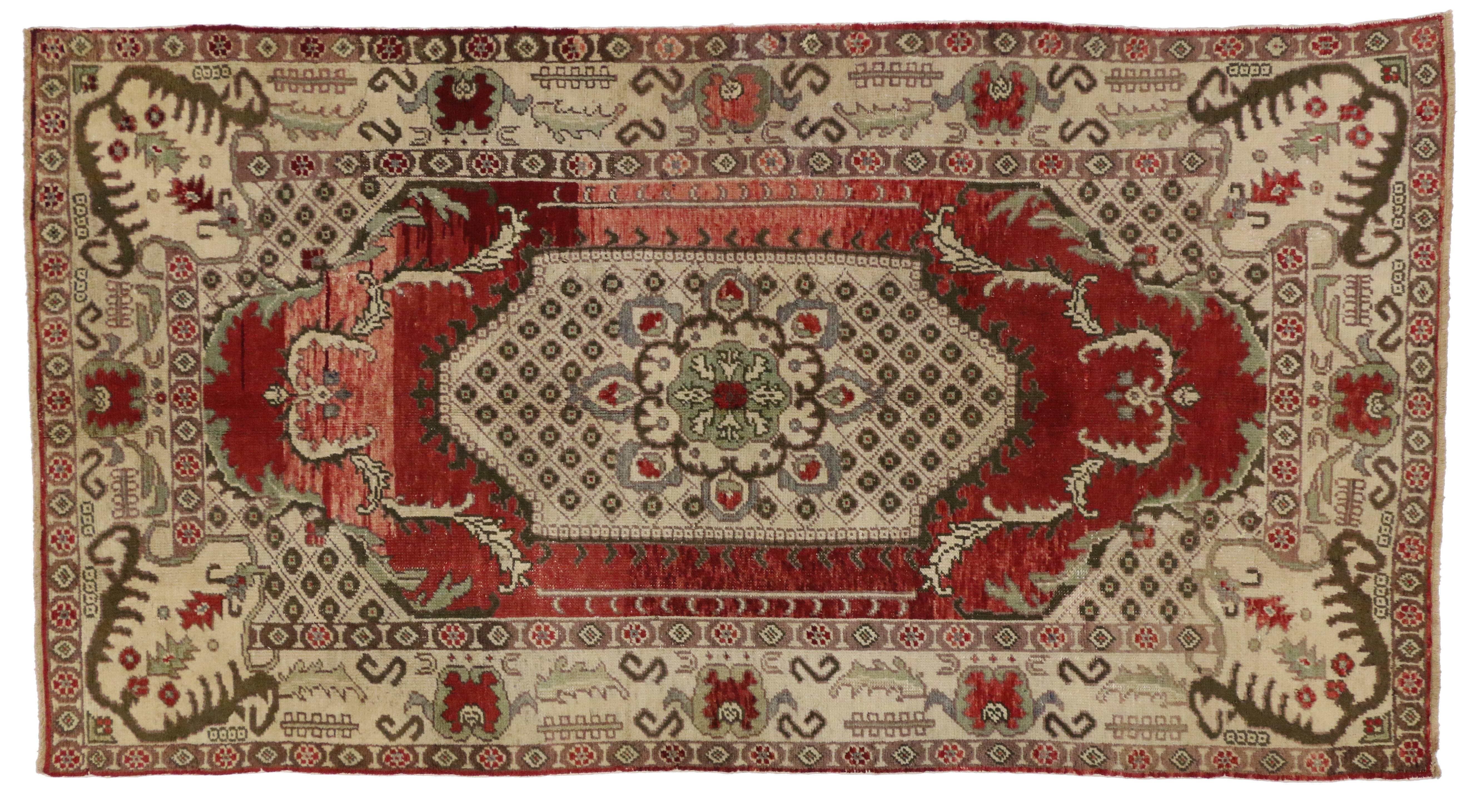 51394 vintage Turkish Oushak gallery rug with classic medallion and corner motif. This opulent Turkish Oushak rug features a rectilinear lozenge in beige on abrashed red field with an intricate center floral medallion in creamy-beige with a slate