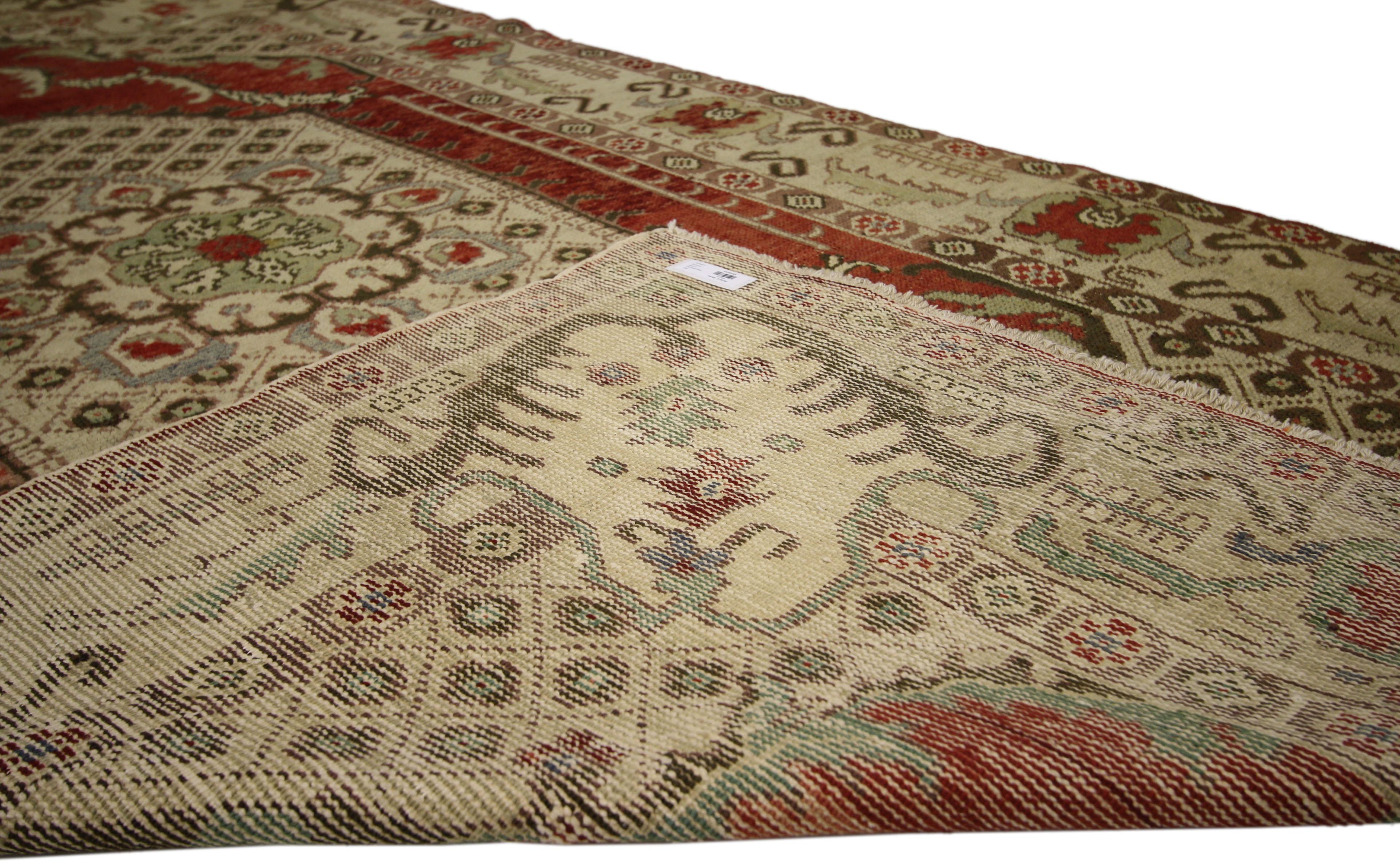 Wool Vintage Turkish Oushak Gallery Rug with Classic Medallion and Corner Motif For Sale