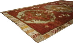 The Legacy of the Anchors: A Vintage Turkish Oushak Rug of Symbolic Grandeur