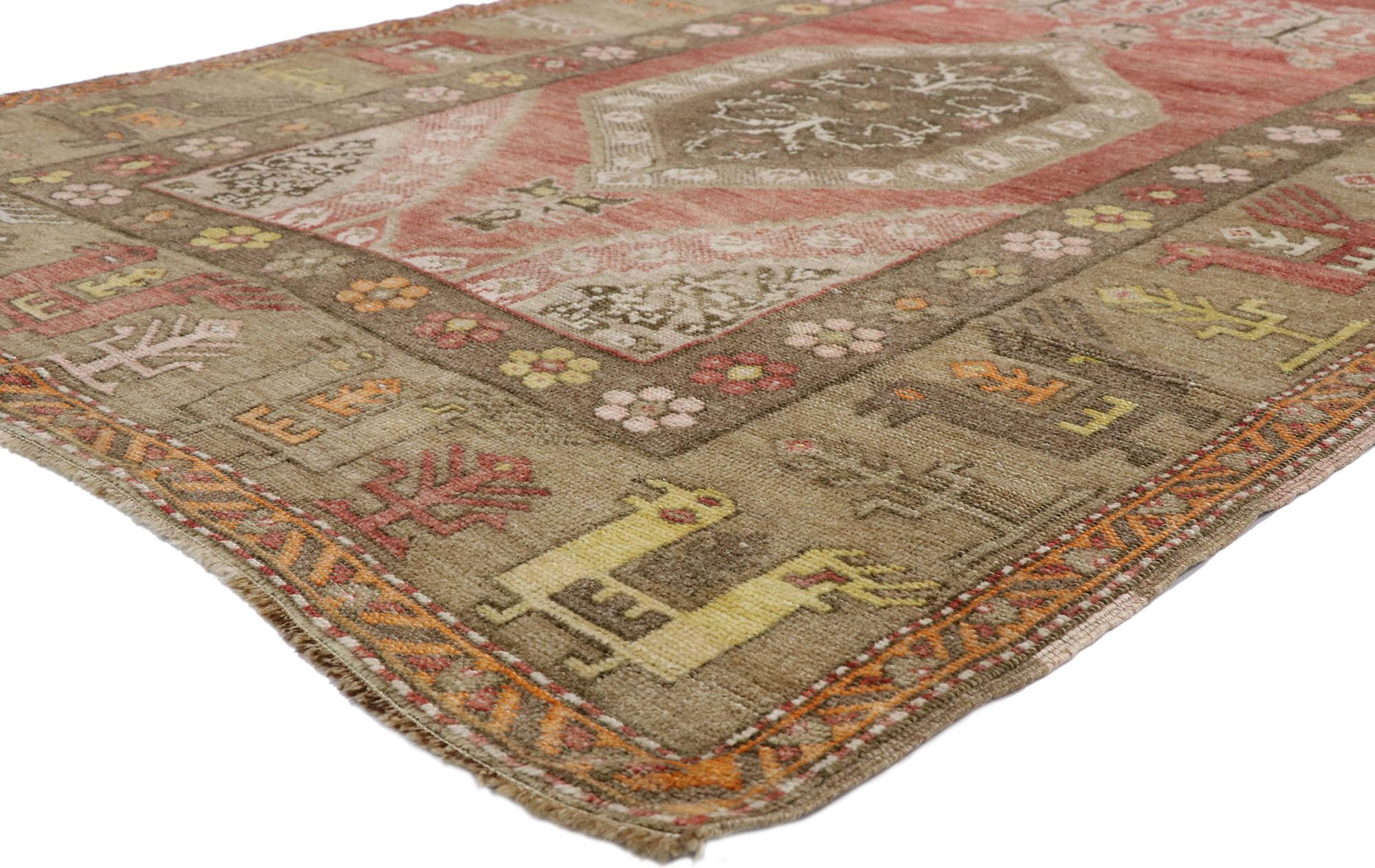 52760 vintage Turkish Oushak Gallery rug with Mid-Century Modern style. This hand knotted wool vintage Turkish Oushak gallery rug features three hexagonal medallions patterned with leafy tendrils floating in a sea of red abrash. The field is dotted