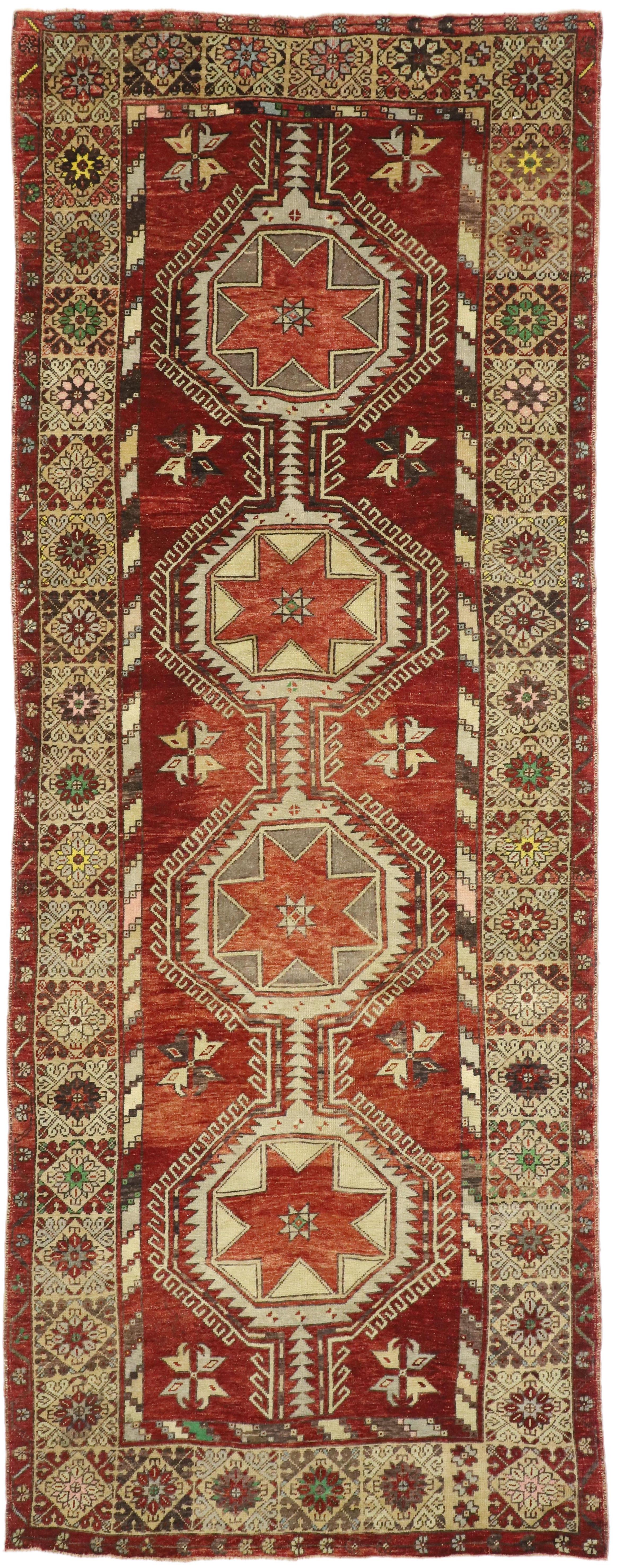 52249 Vintage Turkish Oushak Gallery Rug with Mid-Century Modern Style, Hallway Runner. This hand-knotted wool vintage Turkish Oushak runner features a pole medallion composed of serrated octagonal motifs patterned with eight-point stars connected