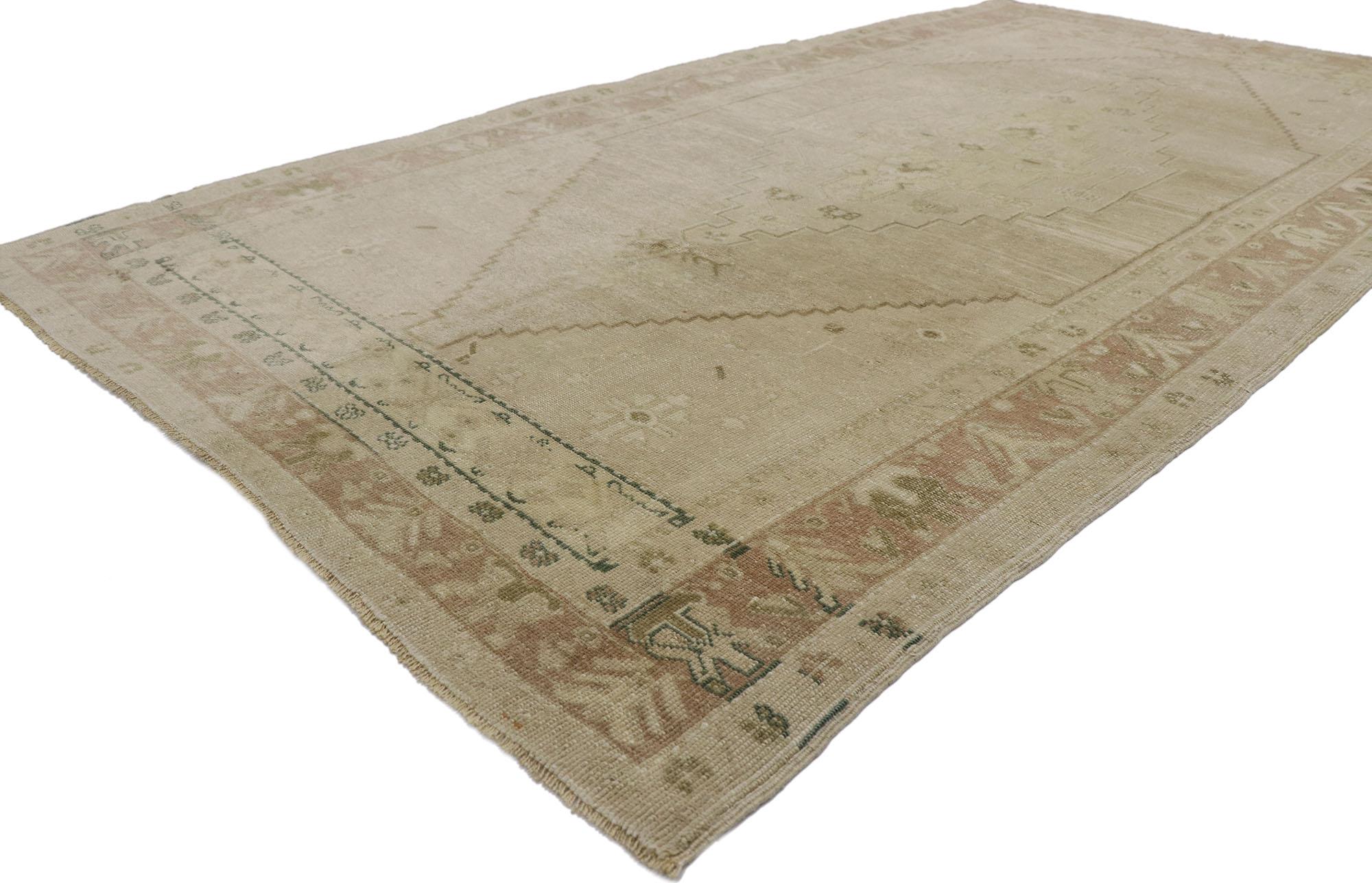 53624 Vintage Turkish Oushak rug with Modern Farmhouse style 04'09 x 08'08. Emanating timeless appeal, effortless beauty and neutral hues, this hand knotted wool vintage Turkish Oushak gallery rug is poised to impress. The antique washed cut-out