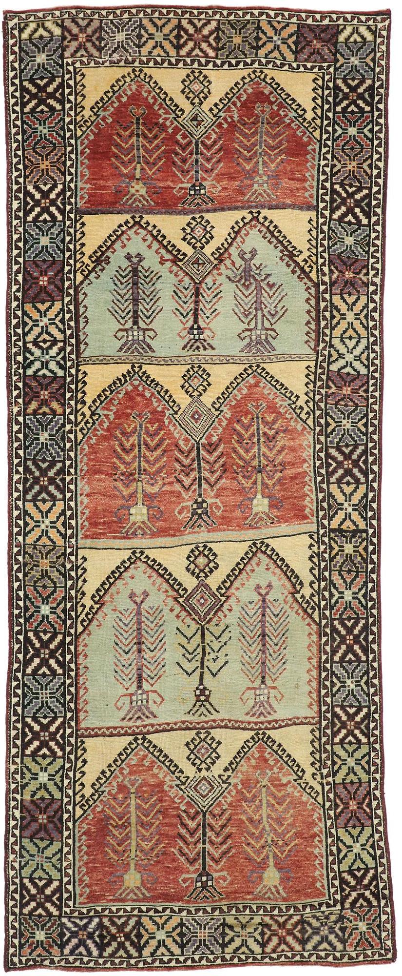 51356 Vintage Anatolian Saph Rug, Turkish Prayer Rug with Multiple Mihrabs 05’04 x 13’04. Time-softened colors and Mid-Century Modern style collide in this hand knotted vintage Anatolian Saph rug. The directional Turkish prayer rug beautifully