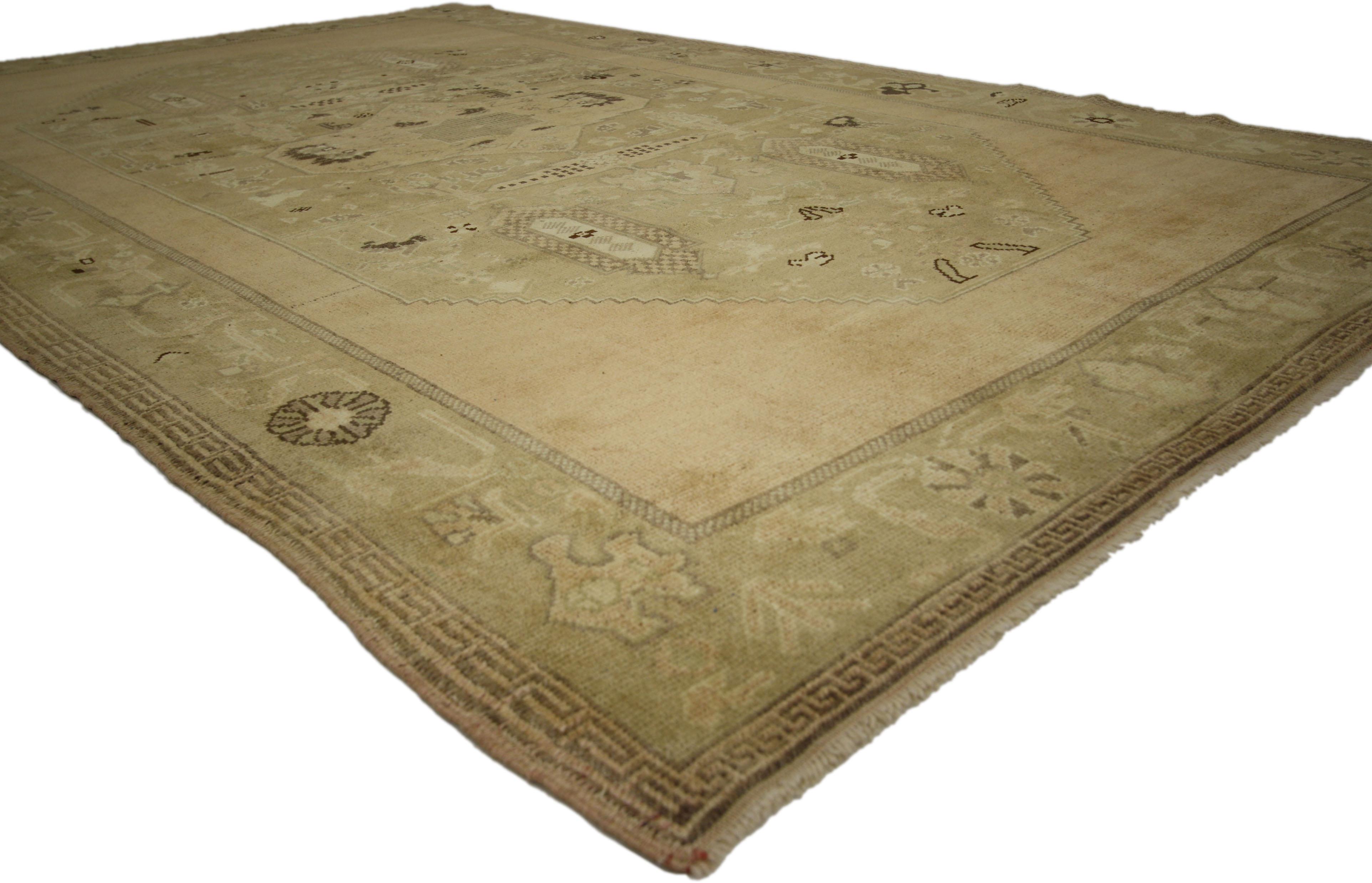 50483, vintage Turkish Oushak gallery rug with rustic chinoiserie style and warm colors. This hand knotted wool vintage Turkish Oushak gallery rug features a large stepped medallion filled with ancient Anatolian motifs. Intimate floral and
