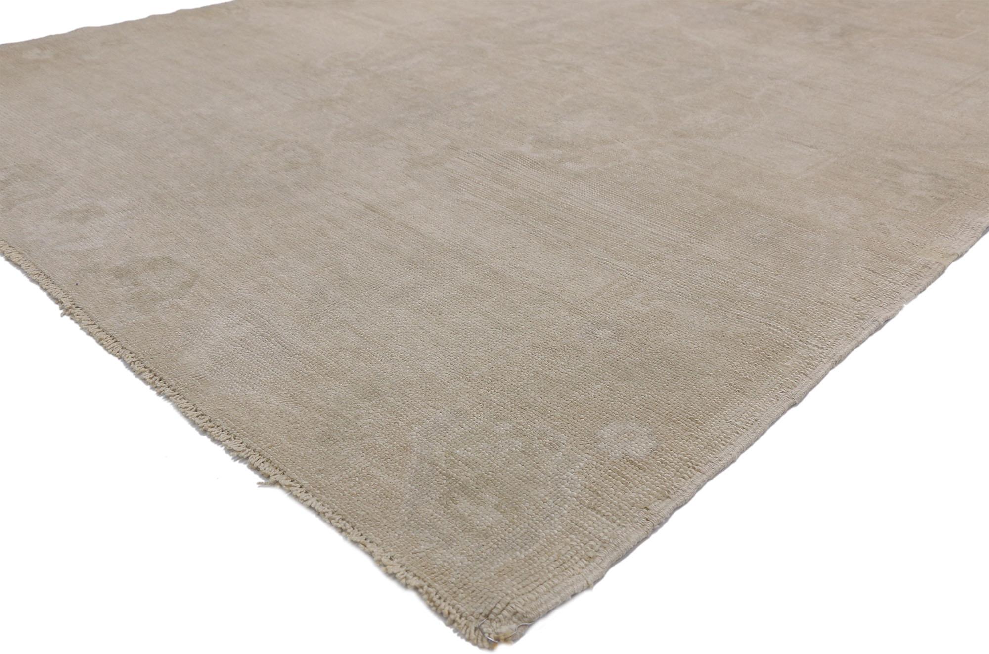 52473 Vintage Turkish Oushak rug with Rustic style and neutral colors. This hand knotted wool vintage Turkish Oushak rug features three ethereal medallions in an open abrashed field. It is enclosed with a subtle Meander floral border. Warm and