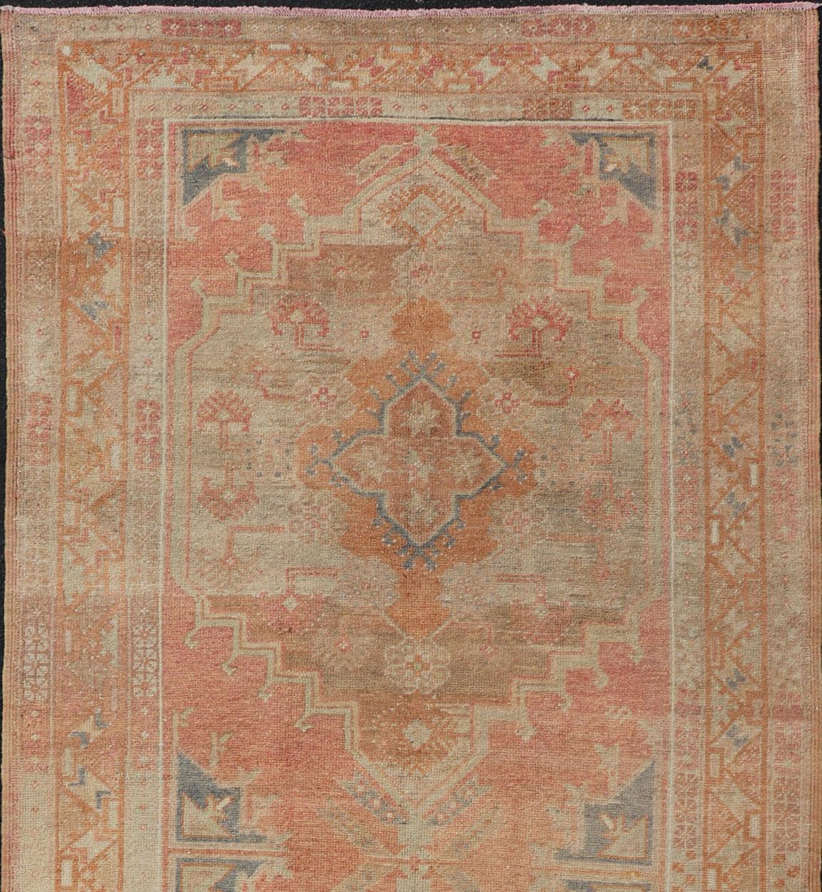 Hand-Knotted Vintage Turkish Oushak Gallery Rug with Tribal Medallion Design Variegated Red For Sale