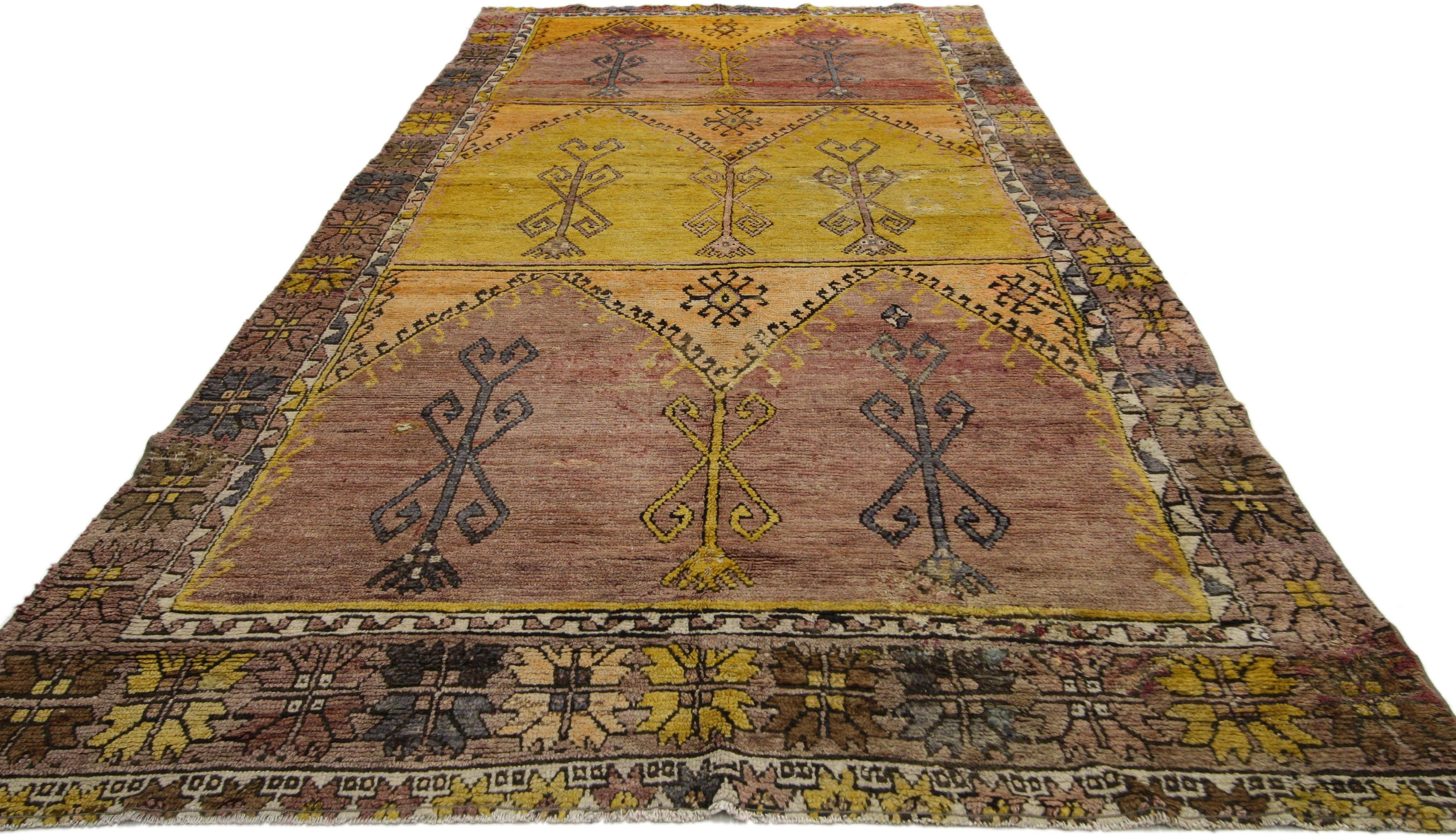 52290 Vintage Turkish Oushak Gallery Rug with Tribal Style, Wide Hallway Runner 04'08 x 10'06. This hand-knotted vintage Turkish Oushak runner with tribal style features three compartments each filled with a double mihrab niche with latch hook