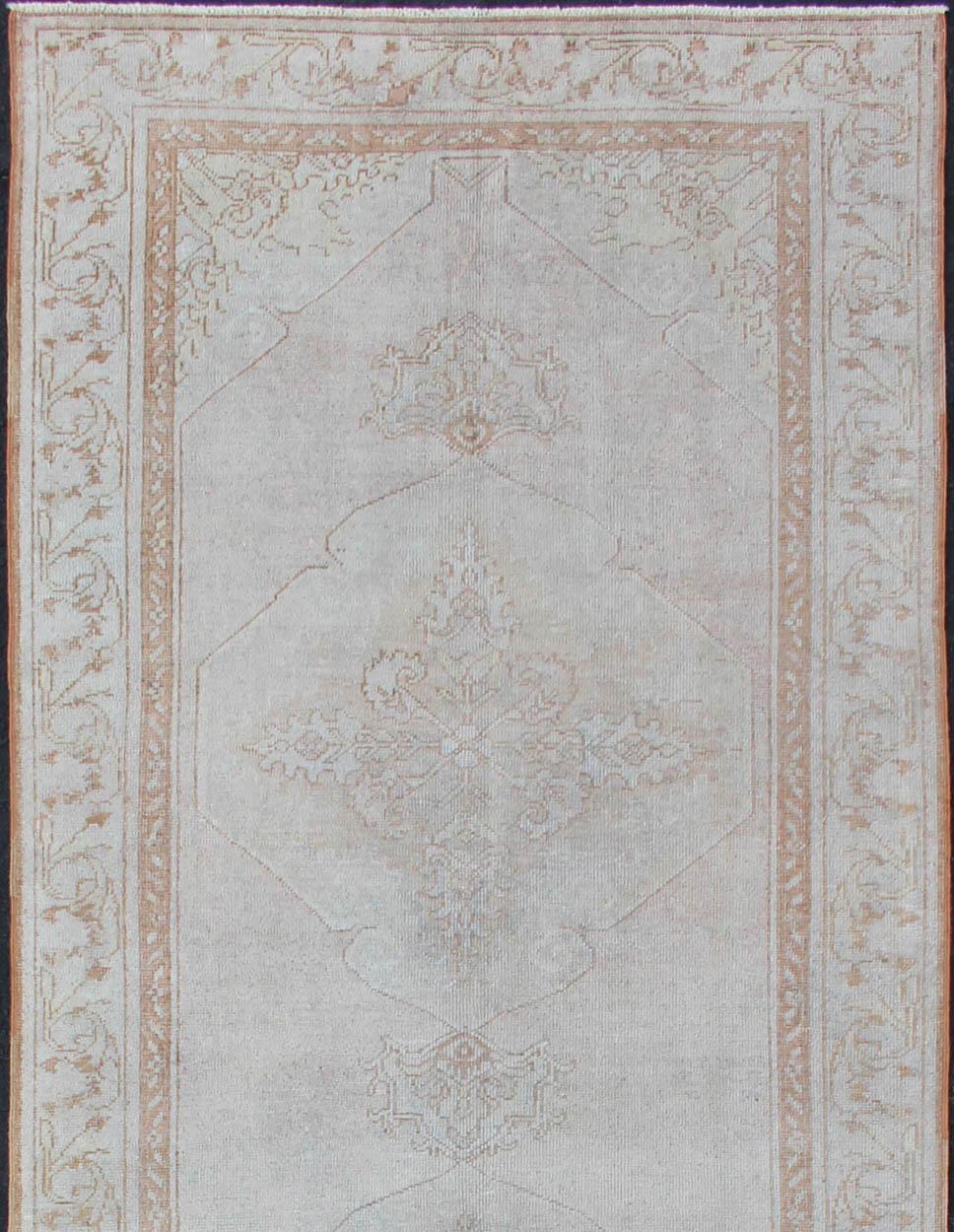 Vintage Turkish Oushak Gallery Runner with Medallions in Muted Tones In Good Condition For Sale In Atlanta, GA