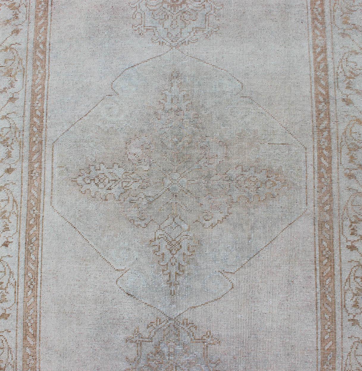 Wool Vintage Turkish Oushak Gallery Runner with Medallions in Muted Tones For Sale