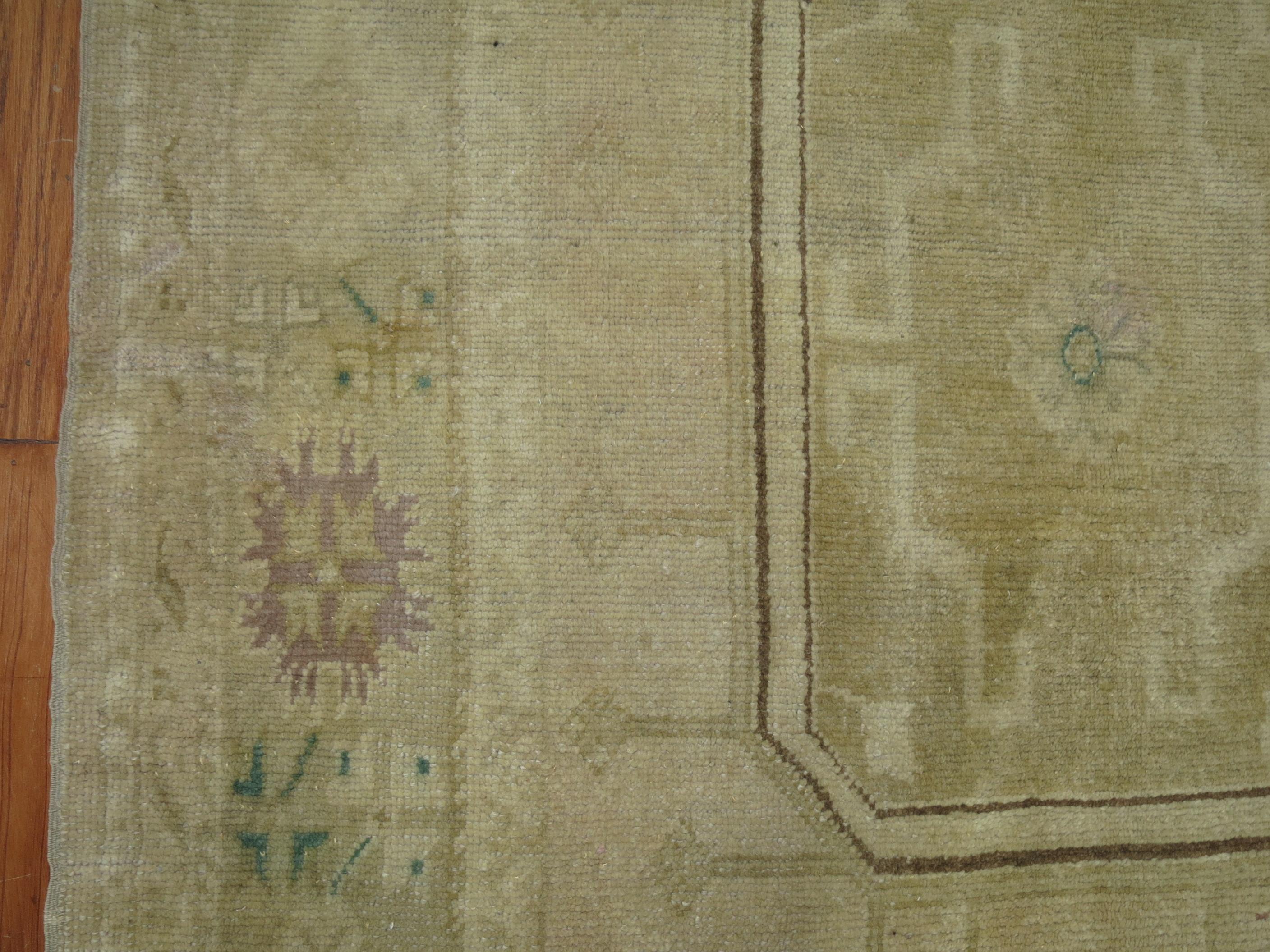 A vintage Turkish oushak neutral color gallery rug 

Measures: 4'8'' x 12'5''.