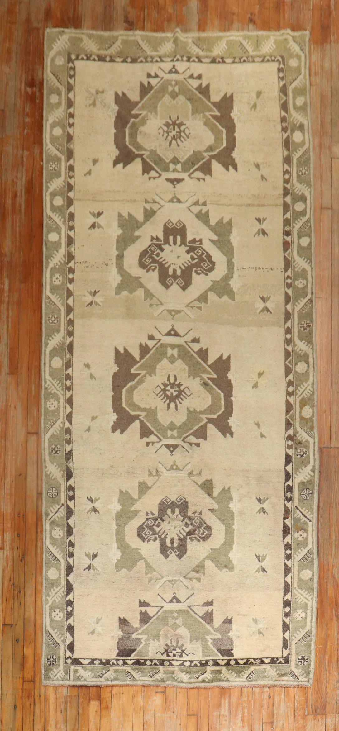 A mid 20th century Turkish Oushak wide Runner 

Measures: 4'10'' x 12'9''.